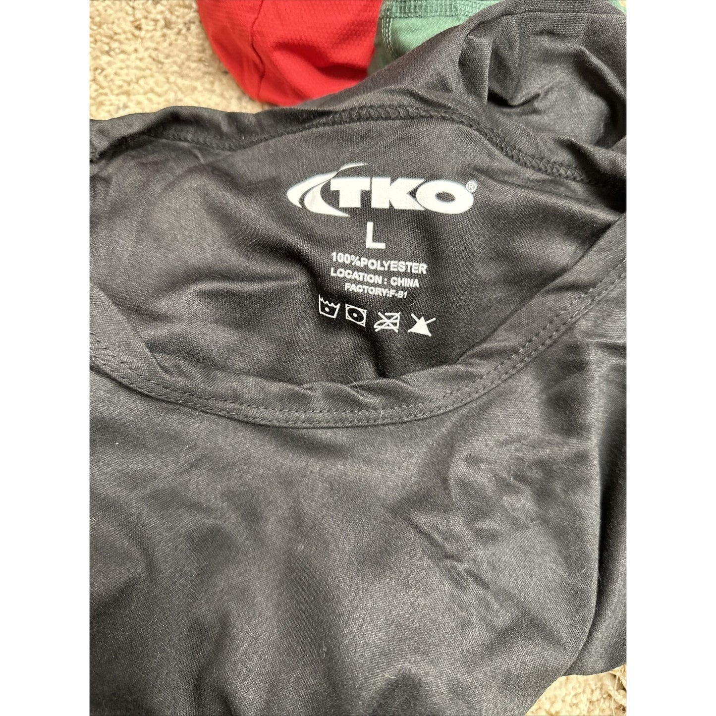 men’s black TKO large 100% poly
