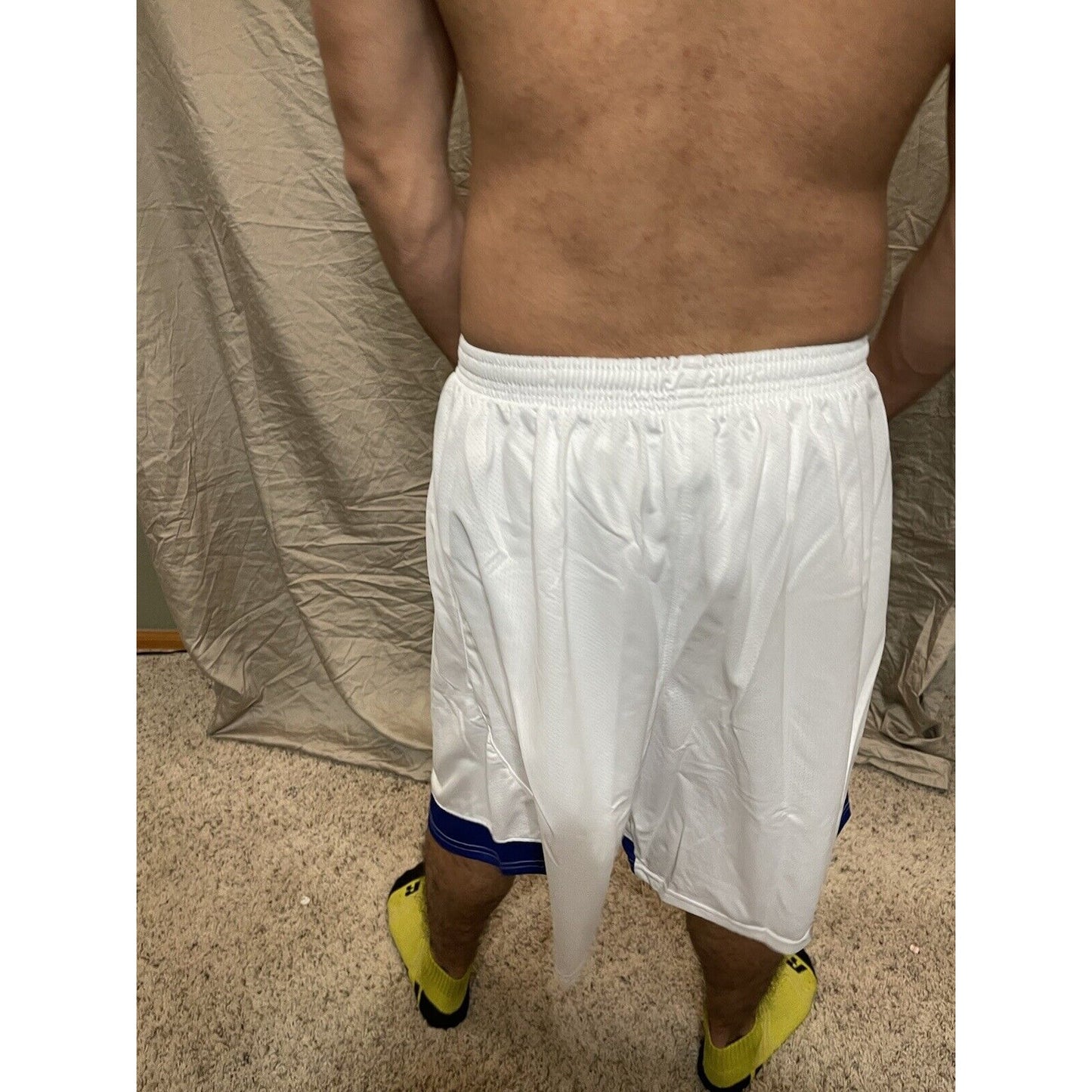 Boy's under armour Youth XL white and Blue Lacrosse style shorts no pockets