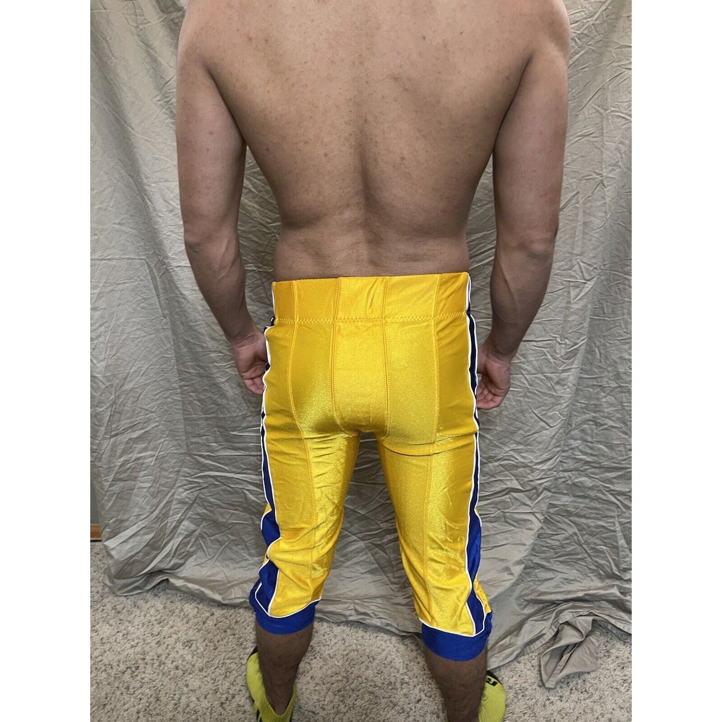men's gold/yellow/blue russell athletics size 34 football pants