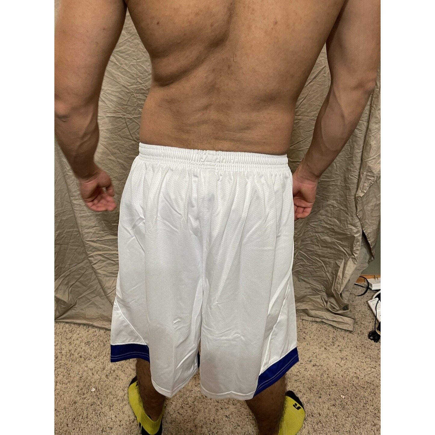 Boy's under armour Youth XL white and Blue Lacrosse style shorts no pockets