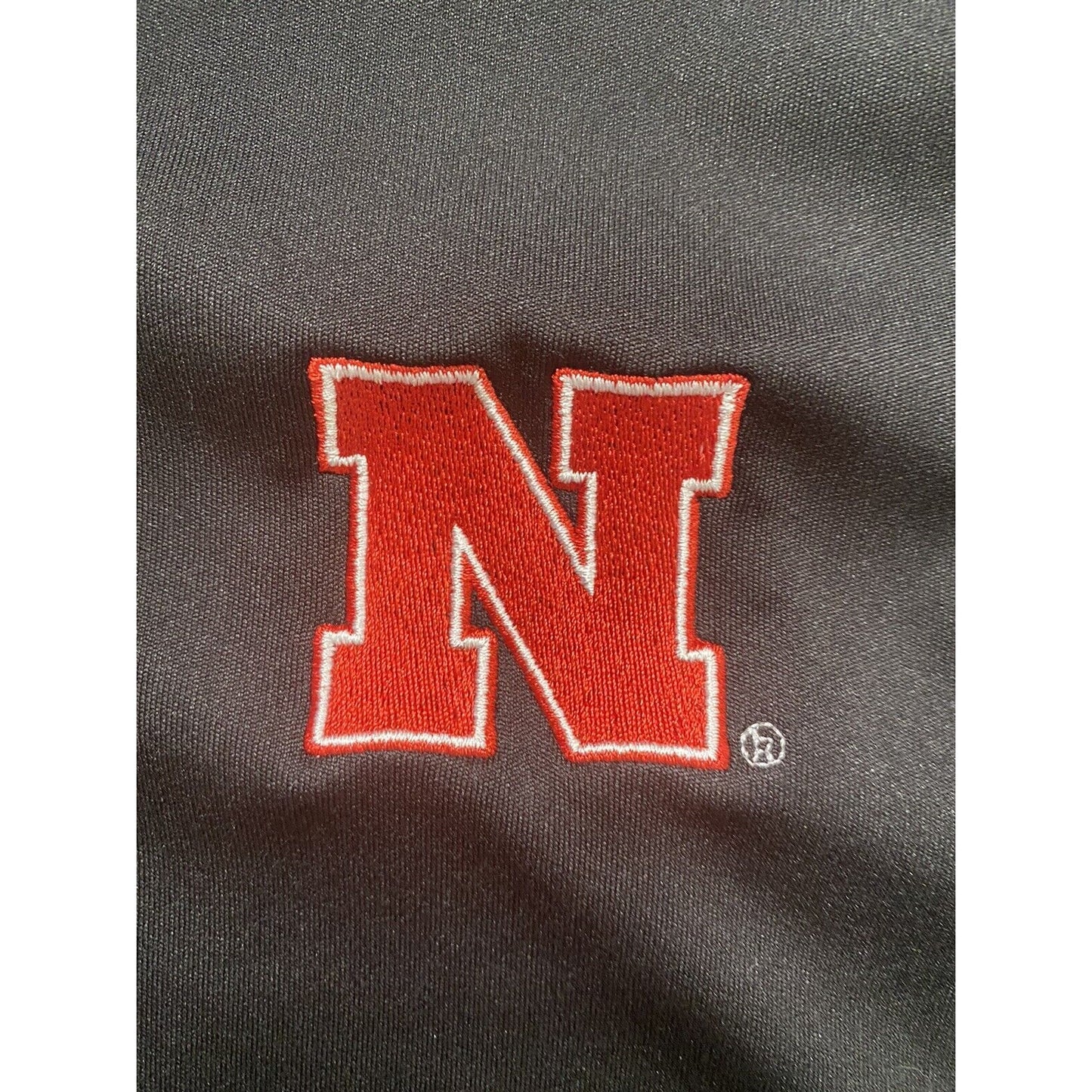 Nebraska Huskers Black Microfiber Cutter & Buck Athletic Polo Shirt