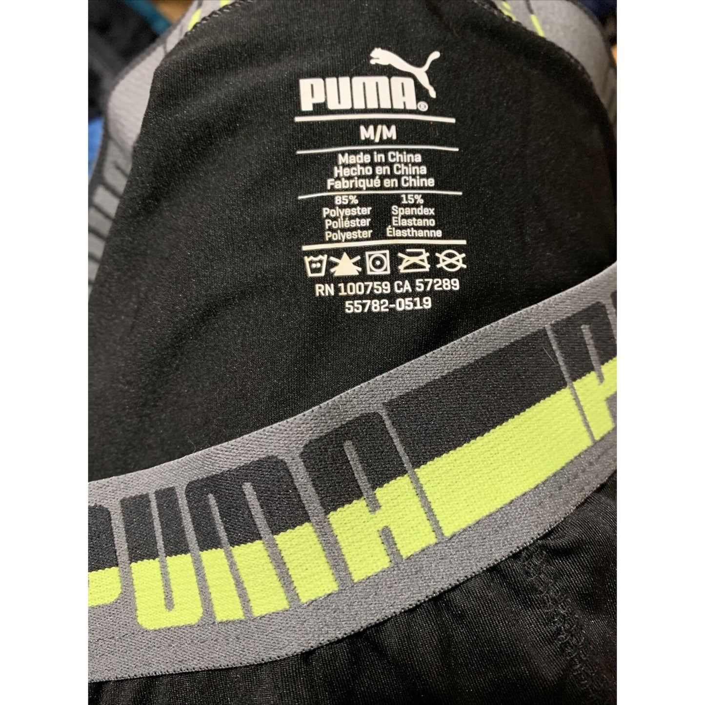 Puma Men’s Black Compression Shorts Medium 15% Spandex Yellow & Black Band