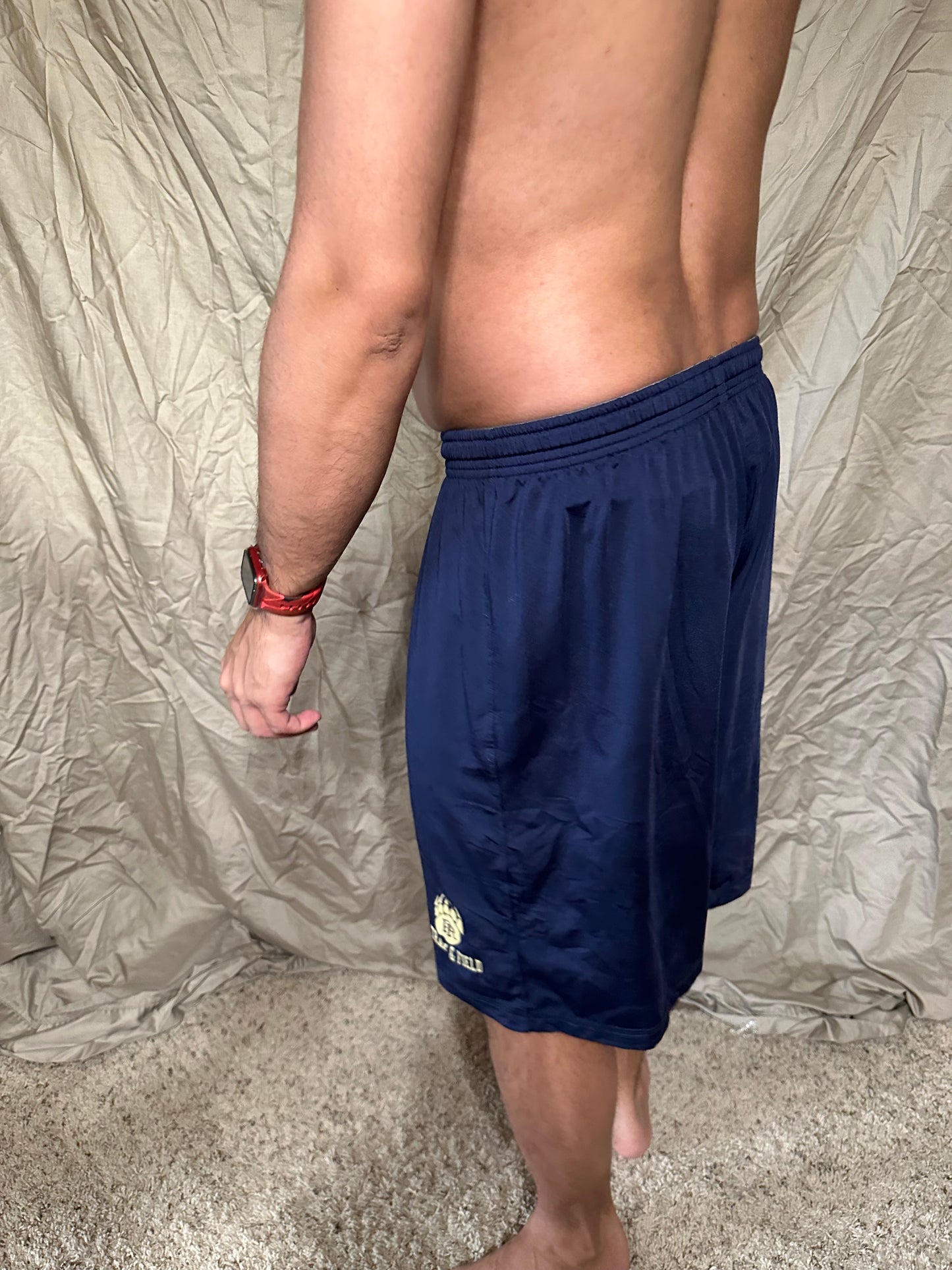 Men’s navy blue under armour heat gear loose shorts athletic no pockets rampart ridge high school track and field