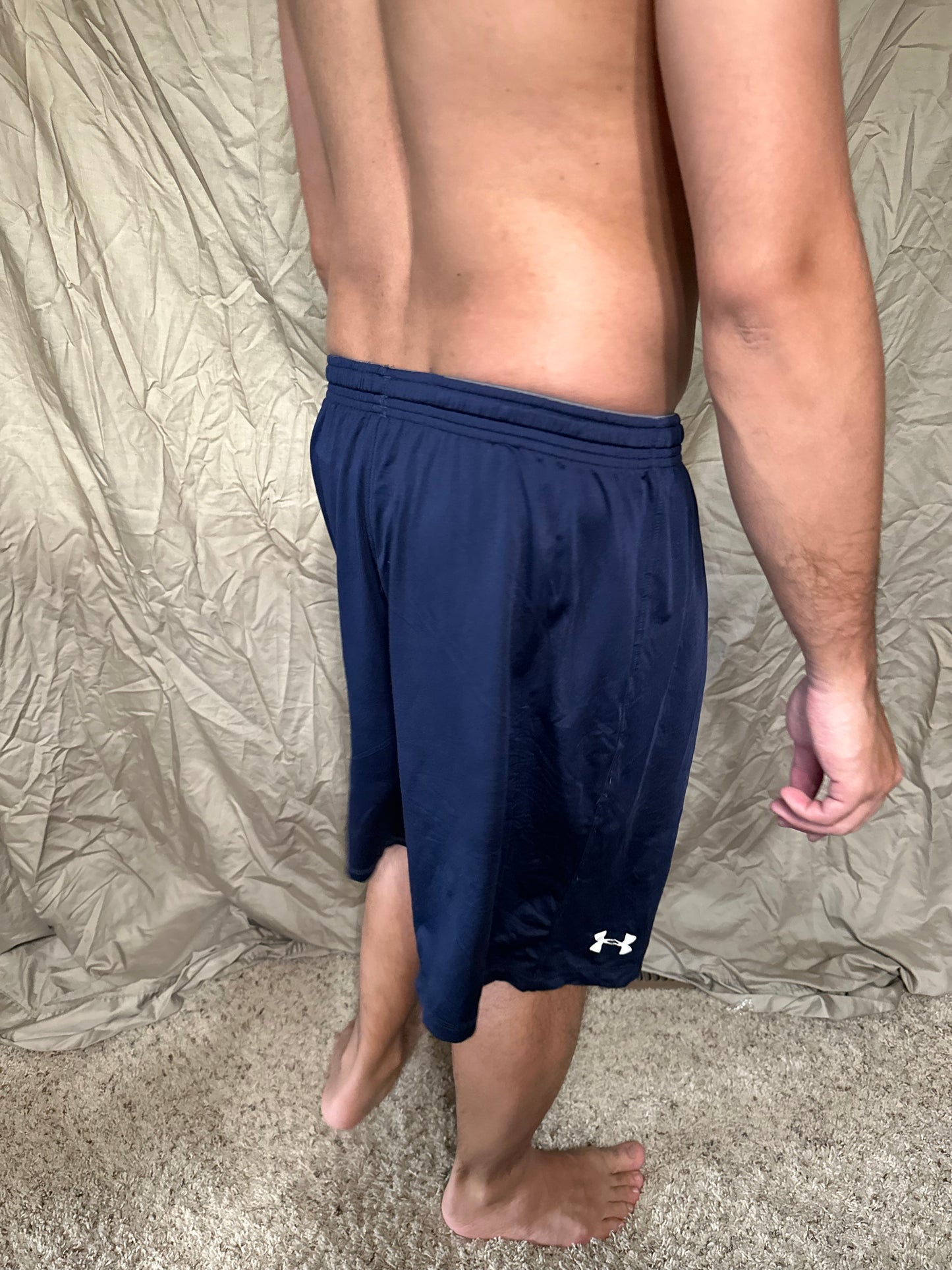 Men’s navy blue under armour heat gear loose shorts athletic no pockets rampart ridge high school track and field