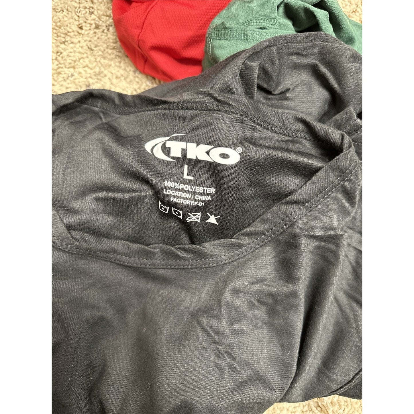 men’s black TKO large 100% poly