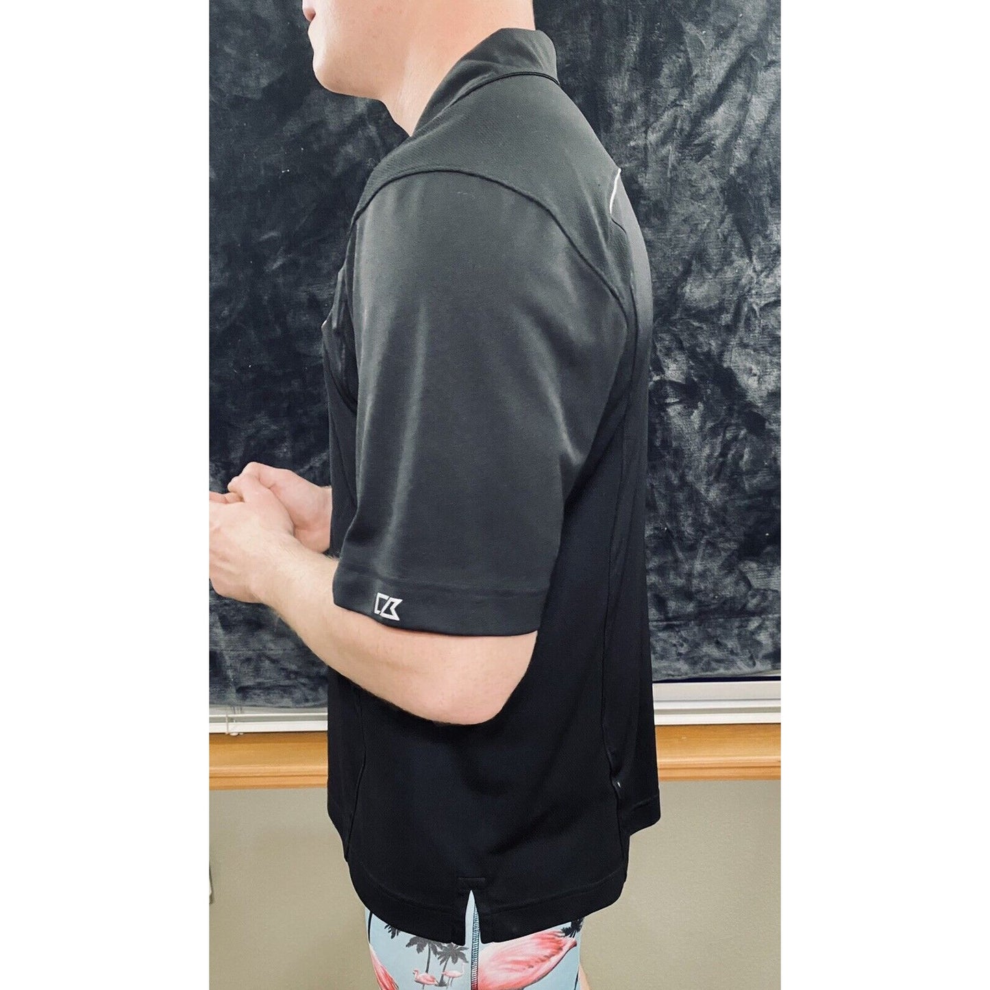 Nebraska Huskers Black Microfiber Cutter & Buck Athletic Polo Shirt
