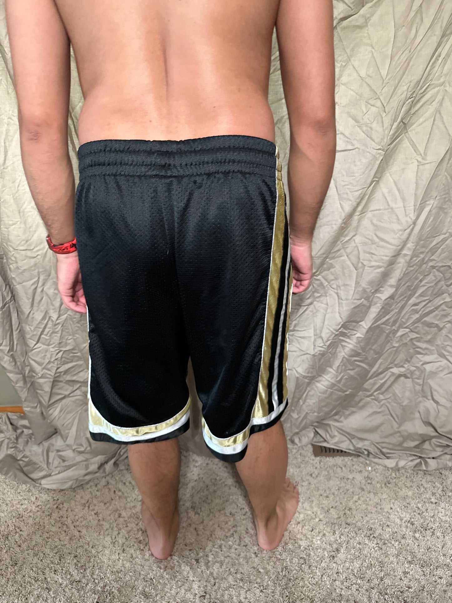 University of Colorado black and gold colosseum size small basketball shorts with pockets