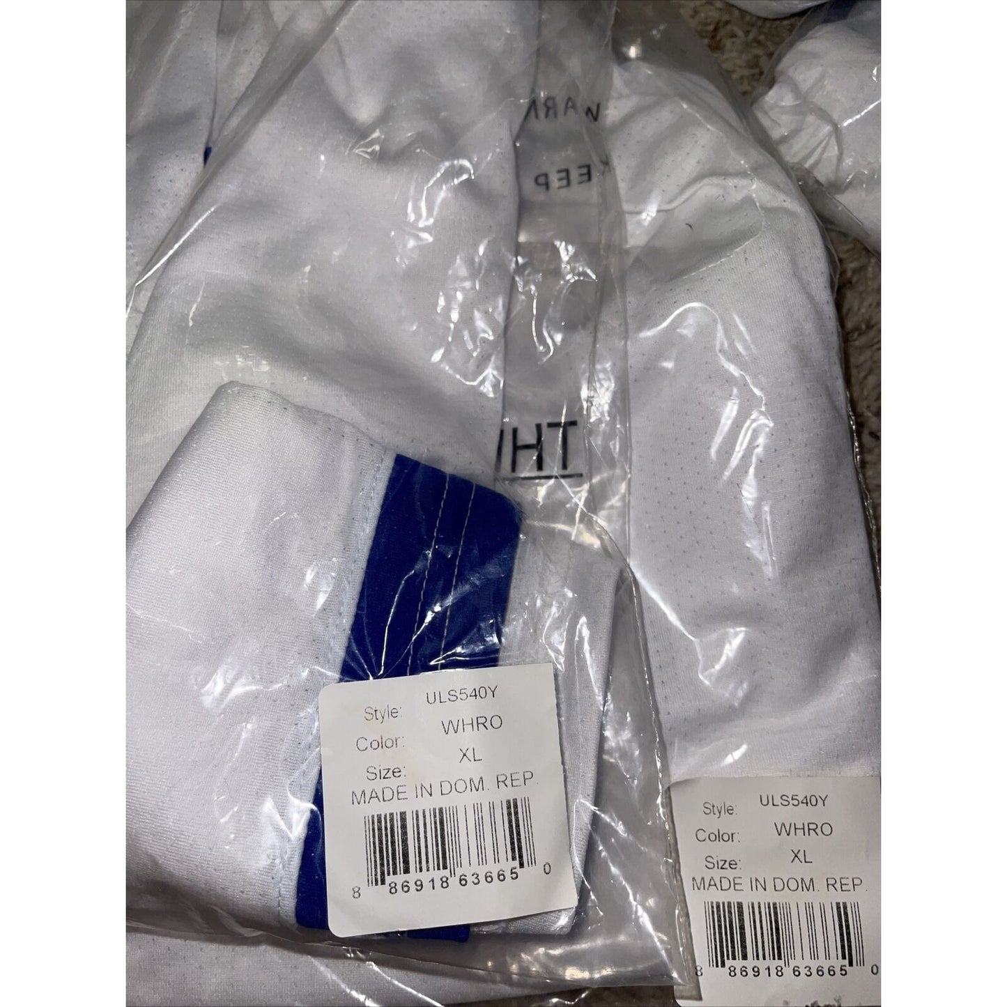 Boy's under armour Youth XL white and Blue Lacrosse style shorts no pockets