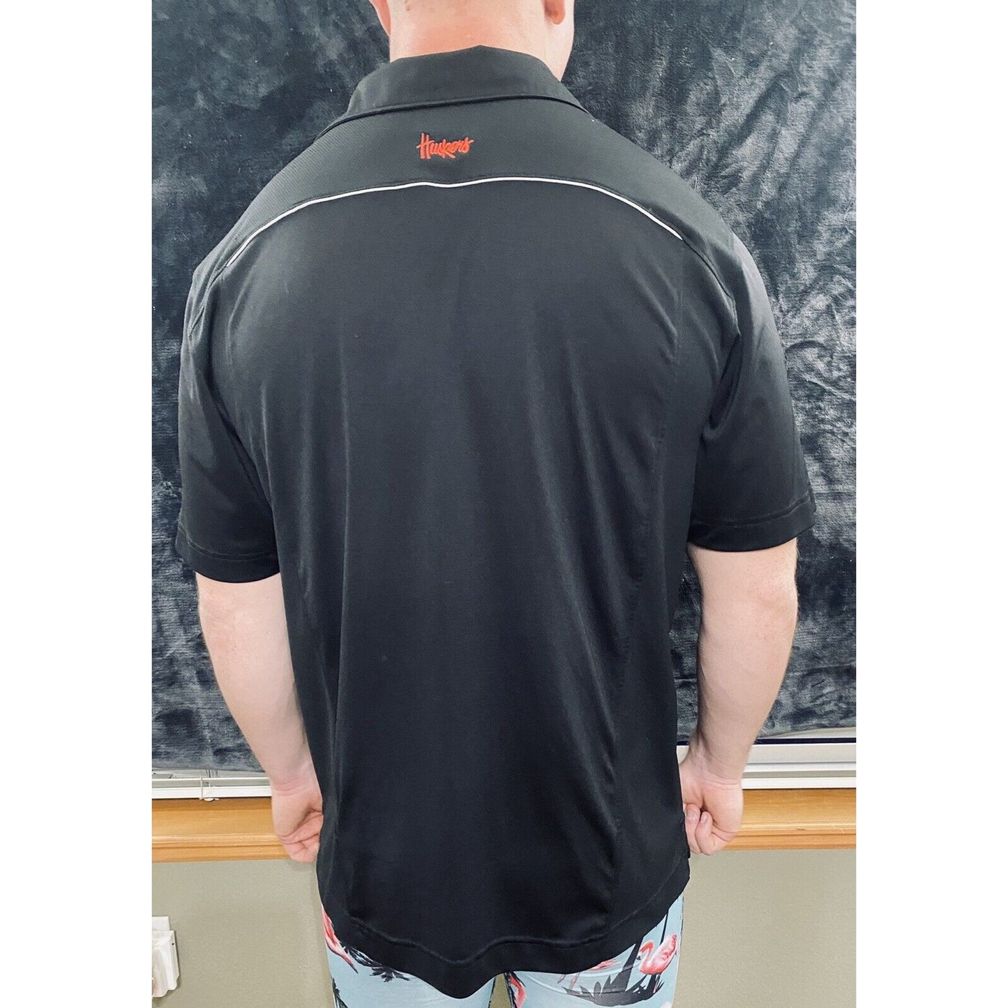 Nebraska Huskers Black Microfiber Cutter & Buck Athletic Polo Shirt