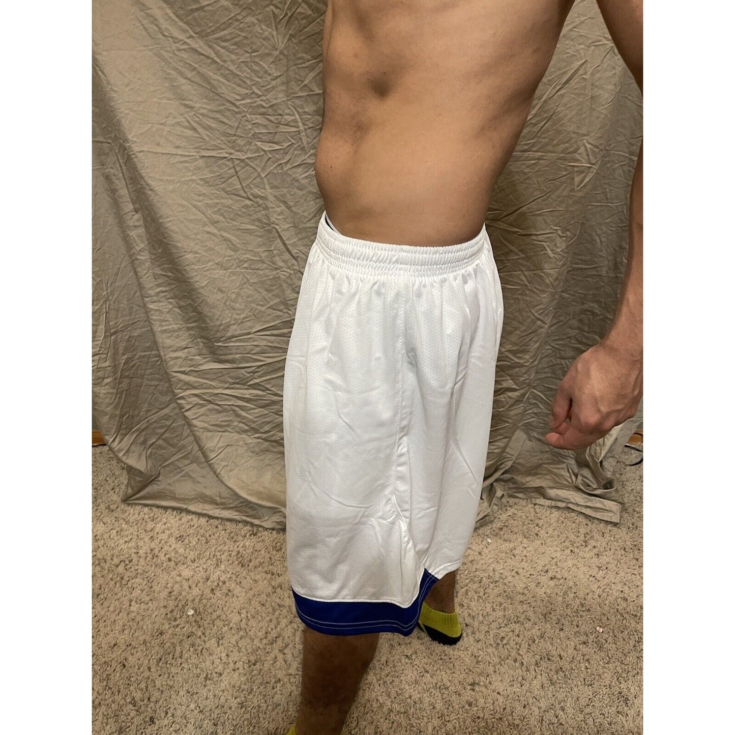 Boy's under armour Youth XL white and Blue Lacrosse style shorts no pockets