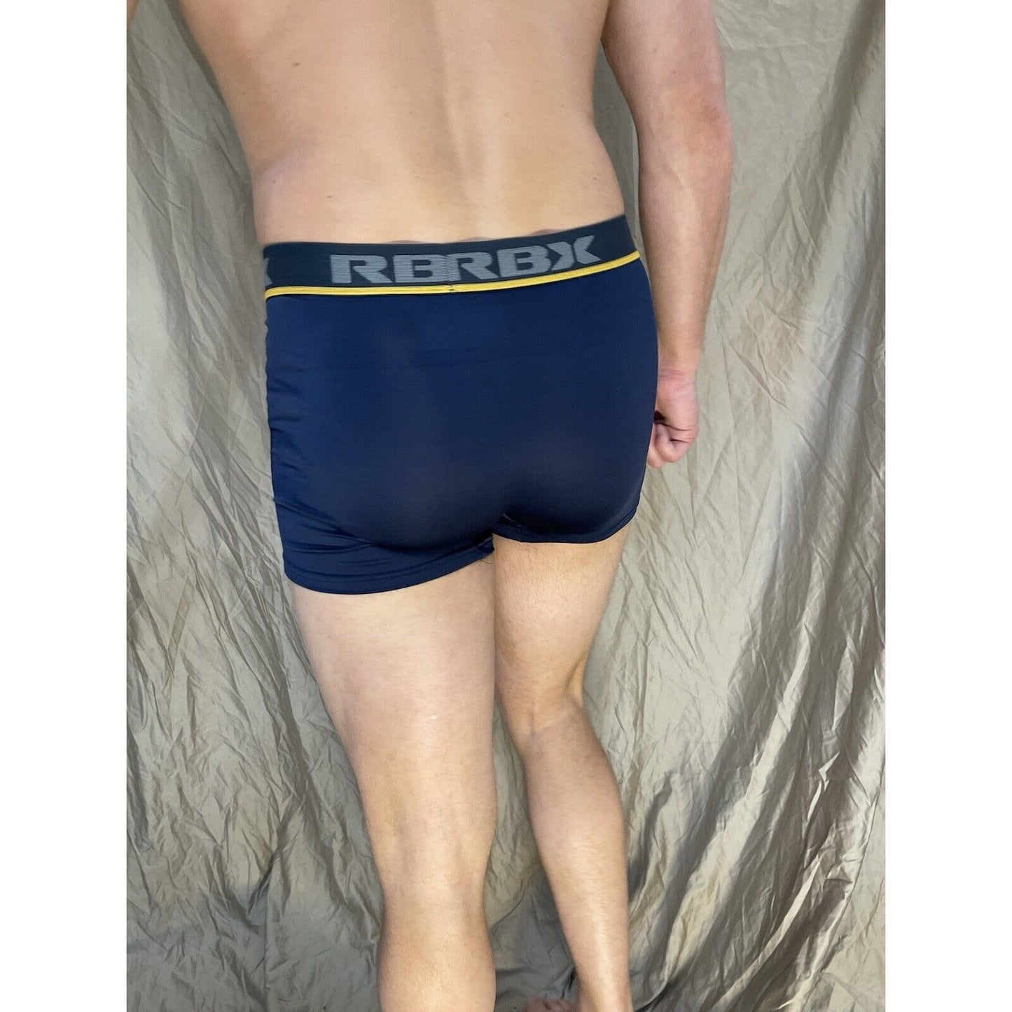 men's blue rbx compression boxer briefs yellow line on band Medium