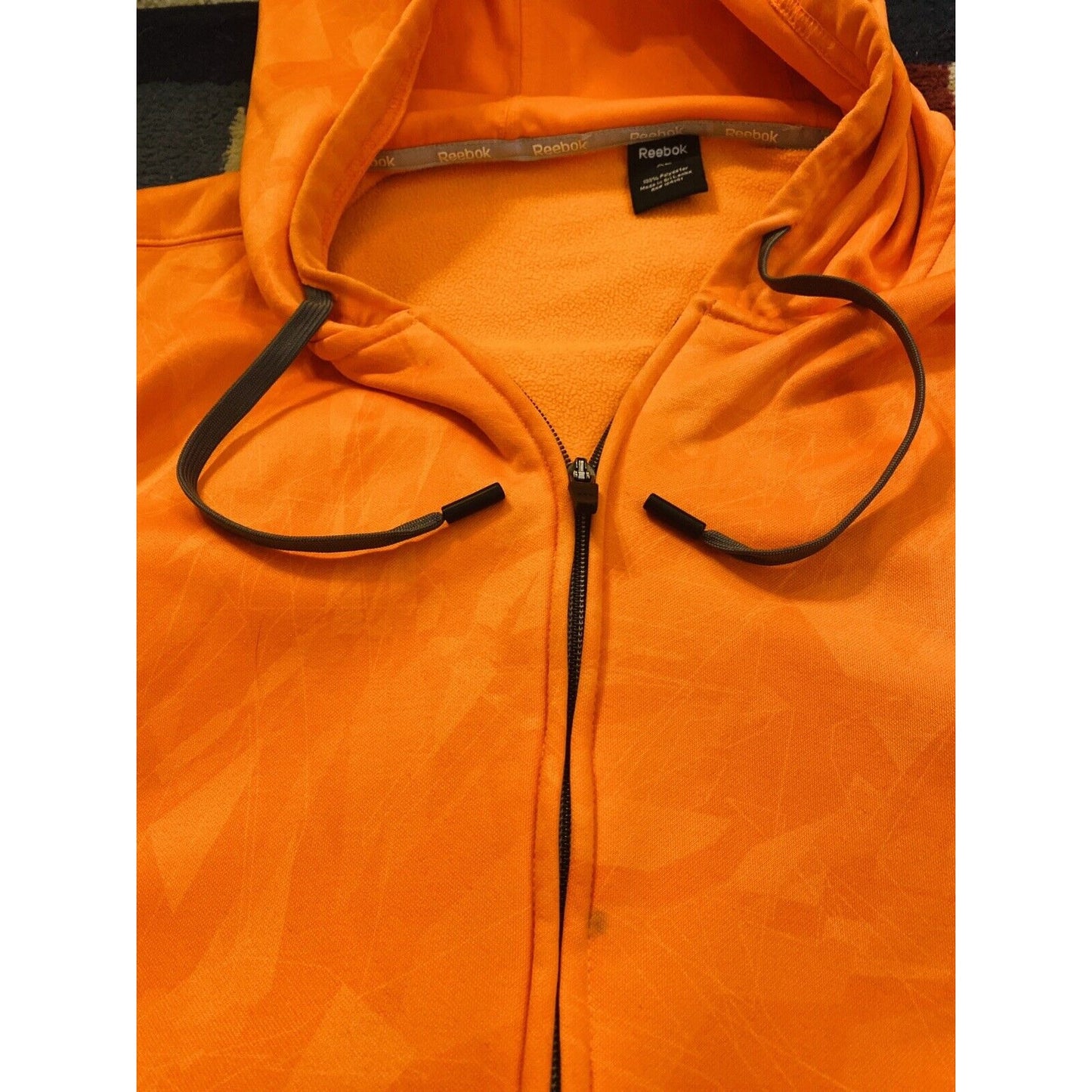 Vintage REEBOK XL Polyester Bright Orange Zip-up Hoodie w/ Geometric Design