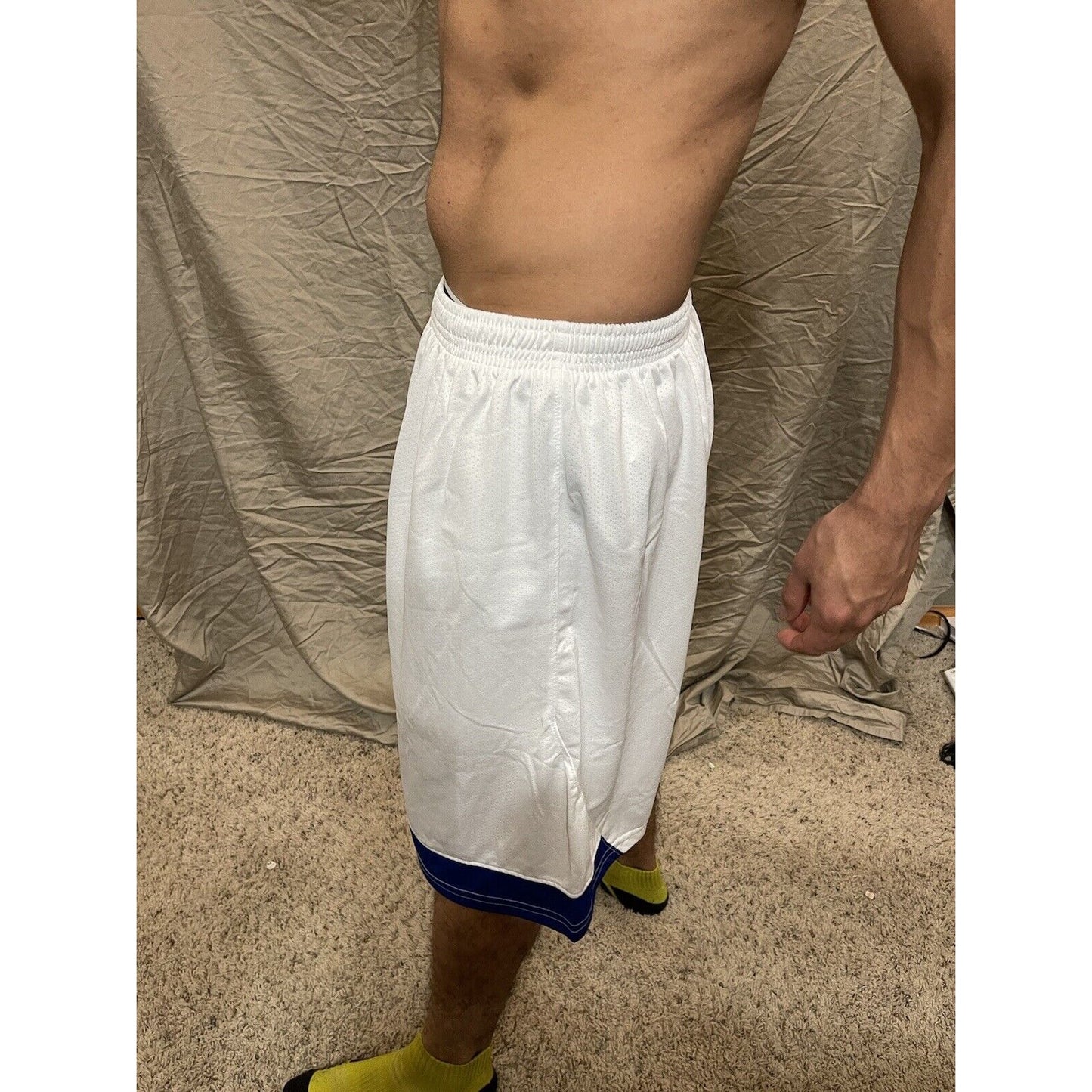 Boy's under armour Youth XL white and Blue Lacrosse style shorts no pockets
