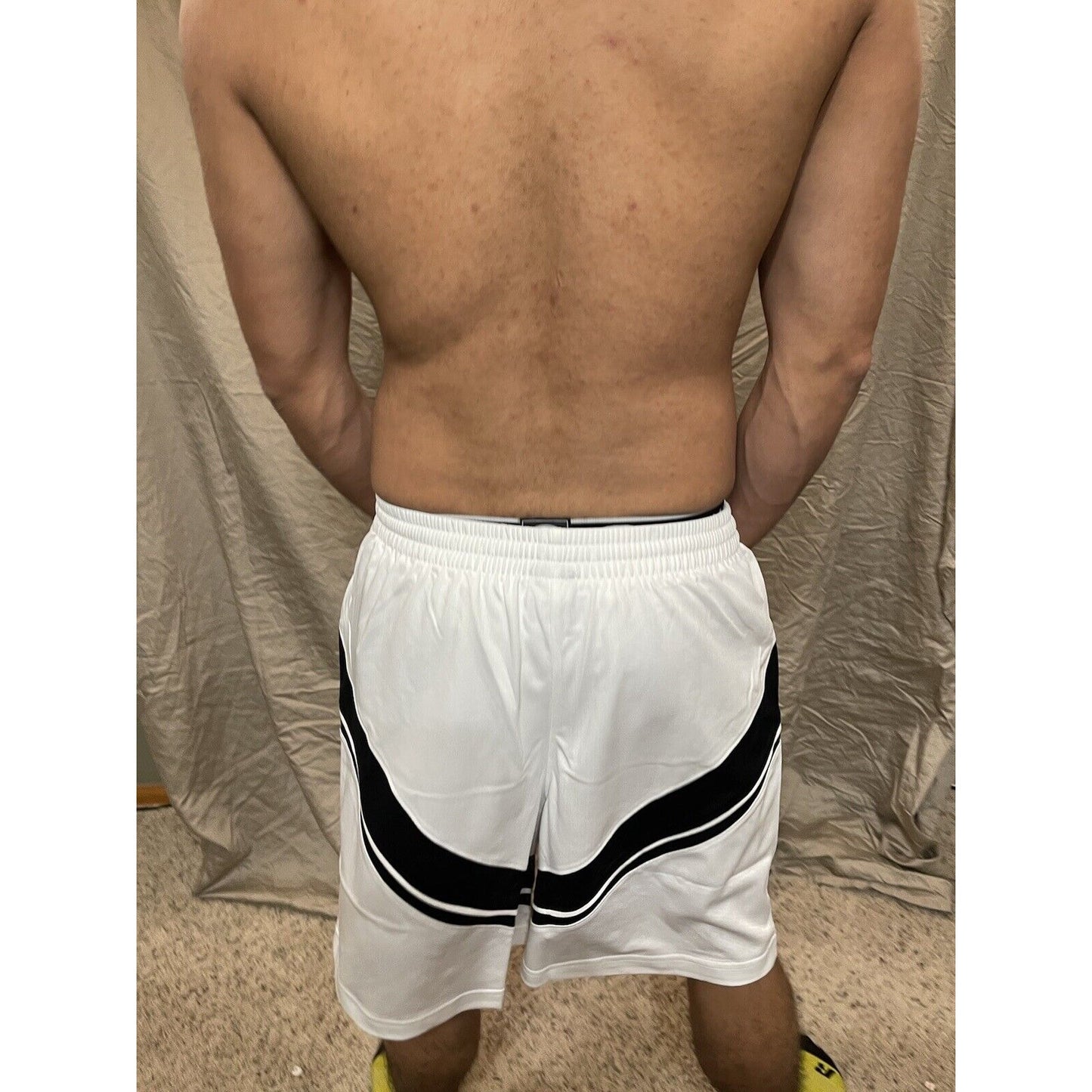 Boy's under armour Youth XL white and Black Lacrosse style shorts no pockets