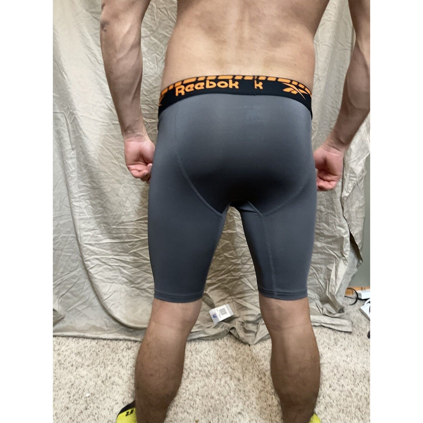Men's gray reebok medium orange band compression shorts
