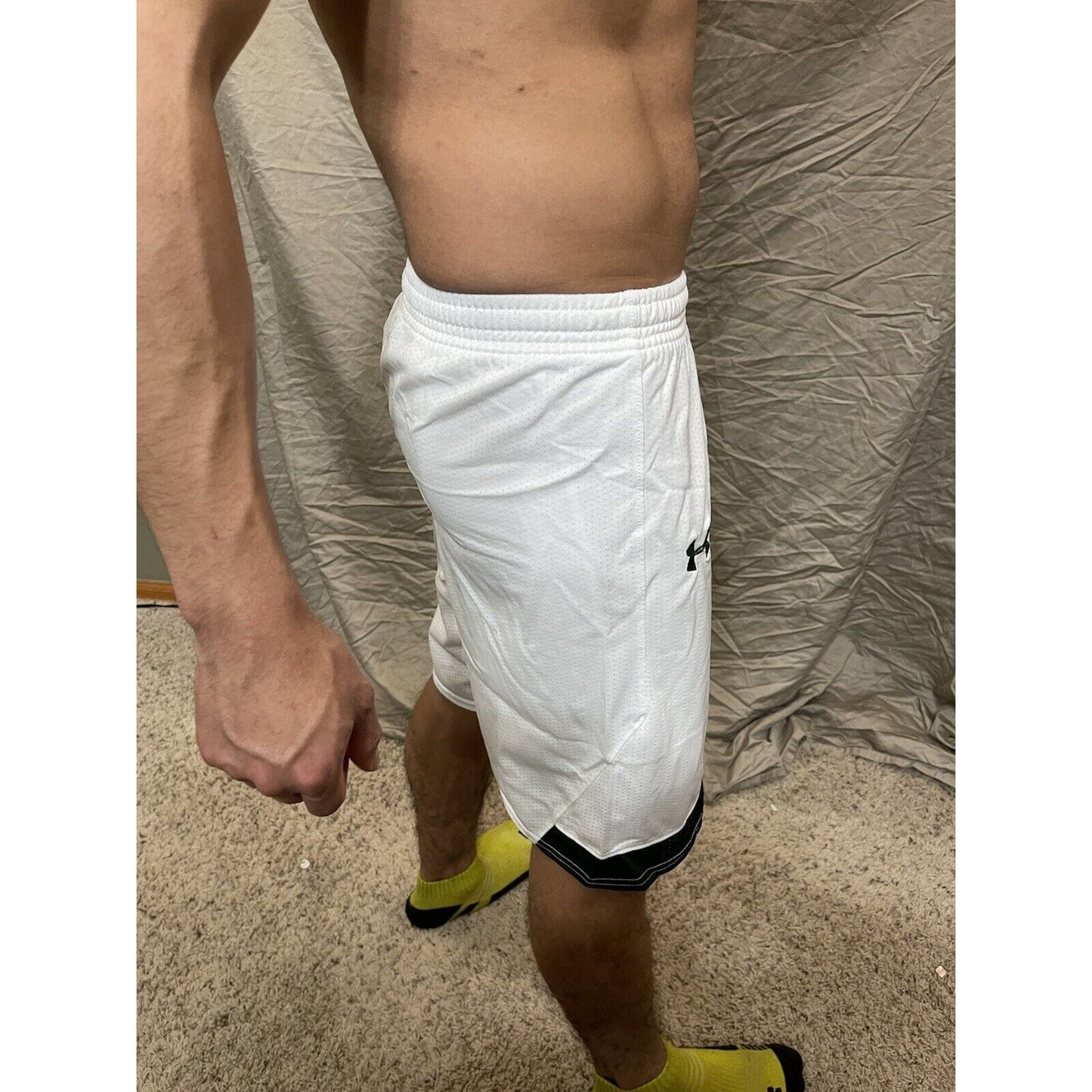 Boy's under armour Youth XL white and Green Lacrosse style shorts no pockets