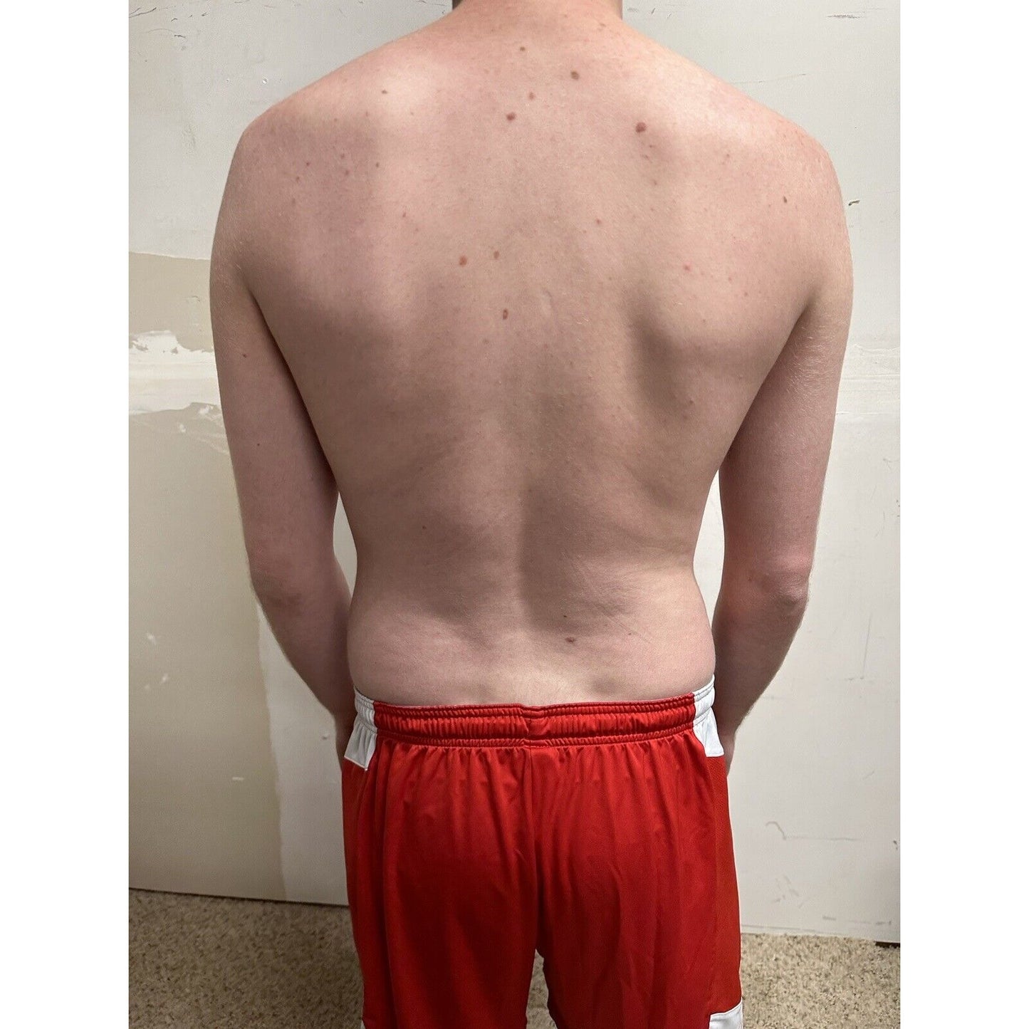 men’s medium under armour red and white athletic shorts