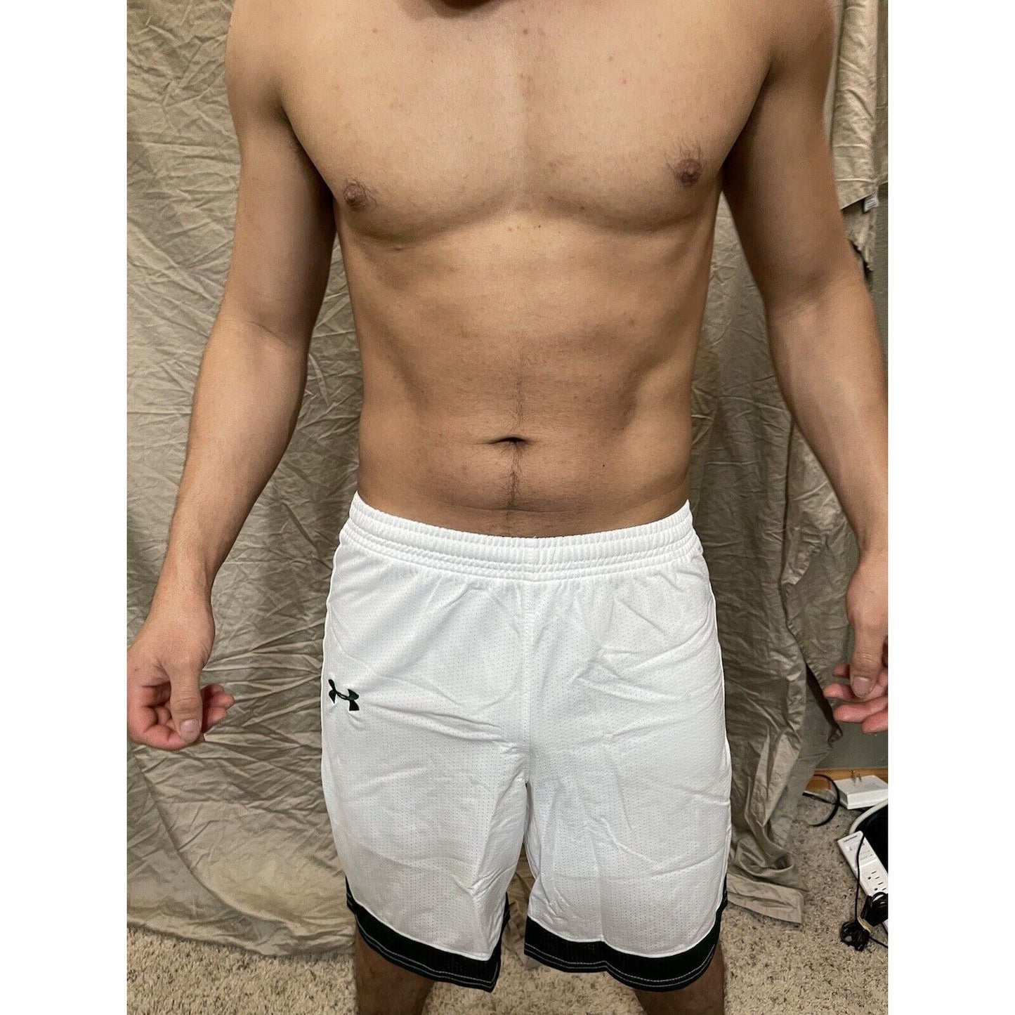 Boy's under armour Youth XL white and Green Lacrosse style shorts no pockets