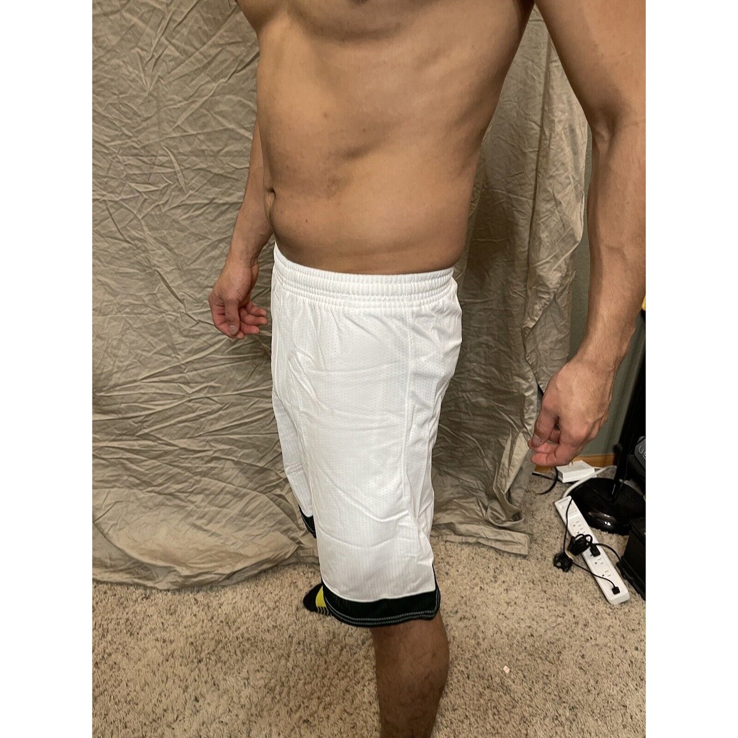 Boy's under armour Youth Large white and Green Lacrosse style shorts no pockets