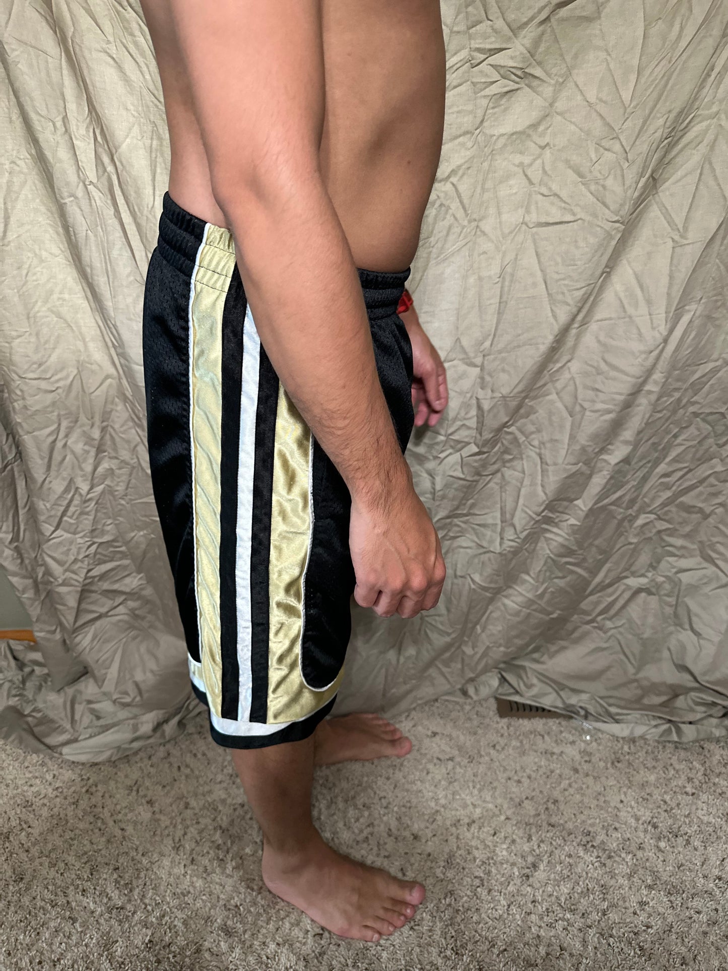 University of Colorado black and gold colosseum size small basketball shorts with pockets