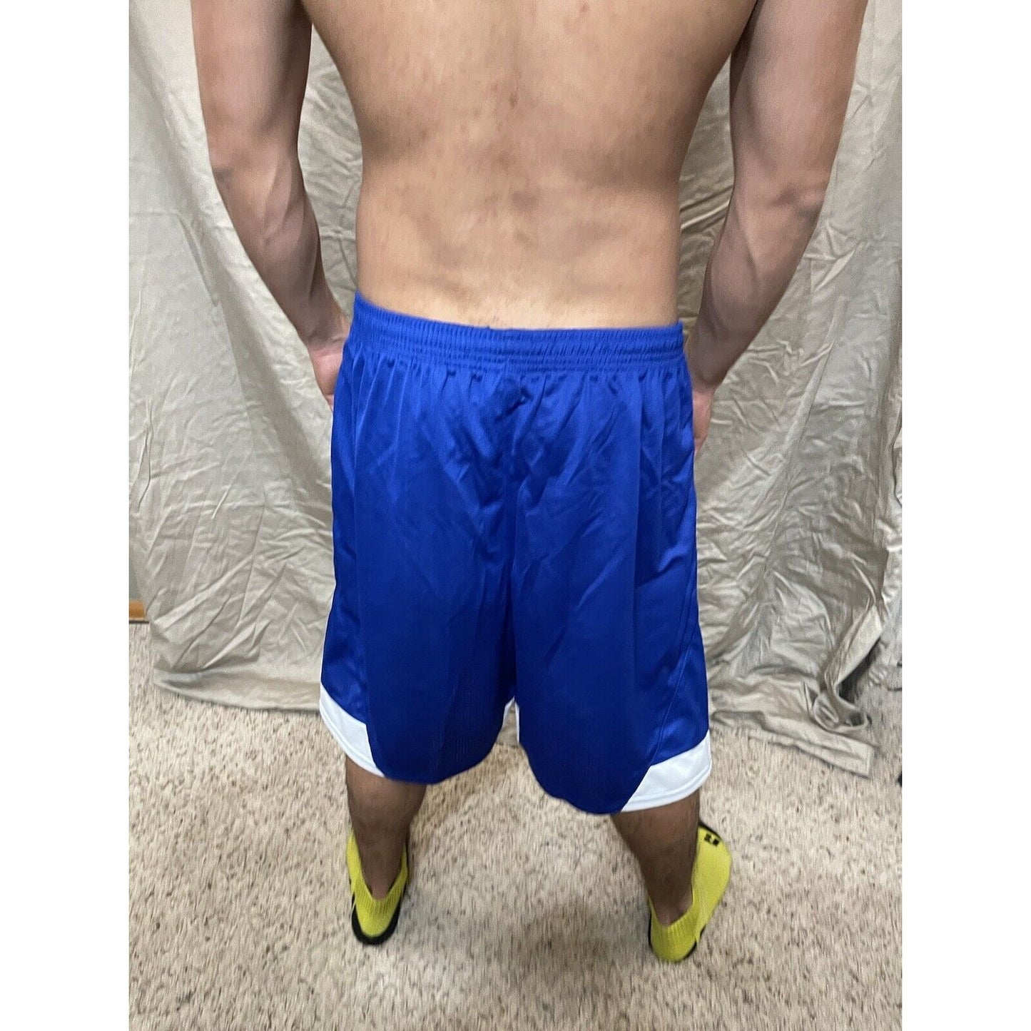 Boy's youth XL scarlet Royal Blue Under armour lacrosse style shorts
