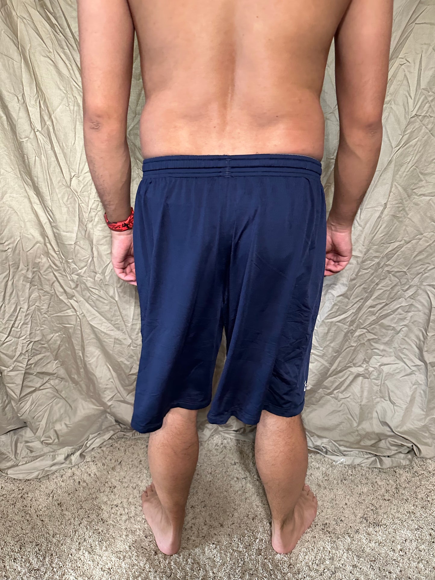 Men’s navy blue under armour heat gear loose shorts athletic no pockets rampart ridge high school track and field