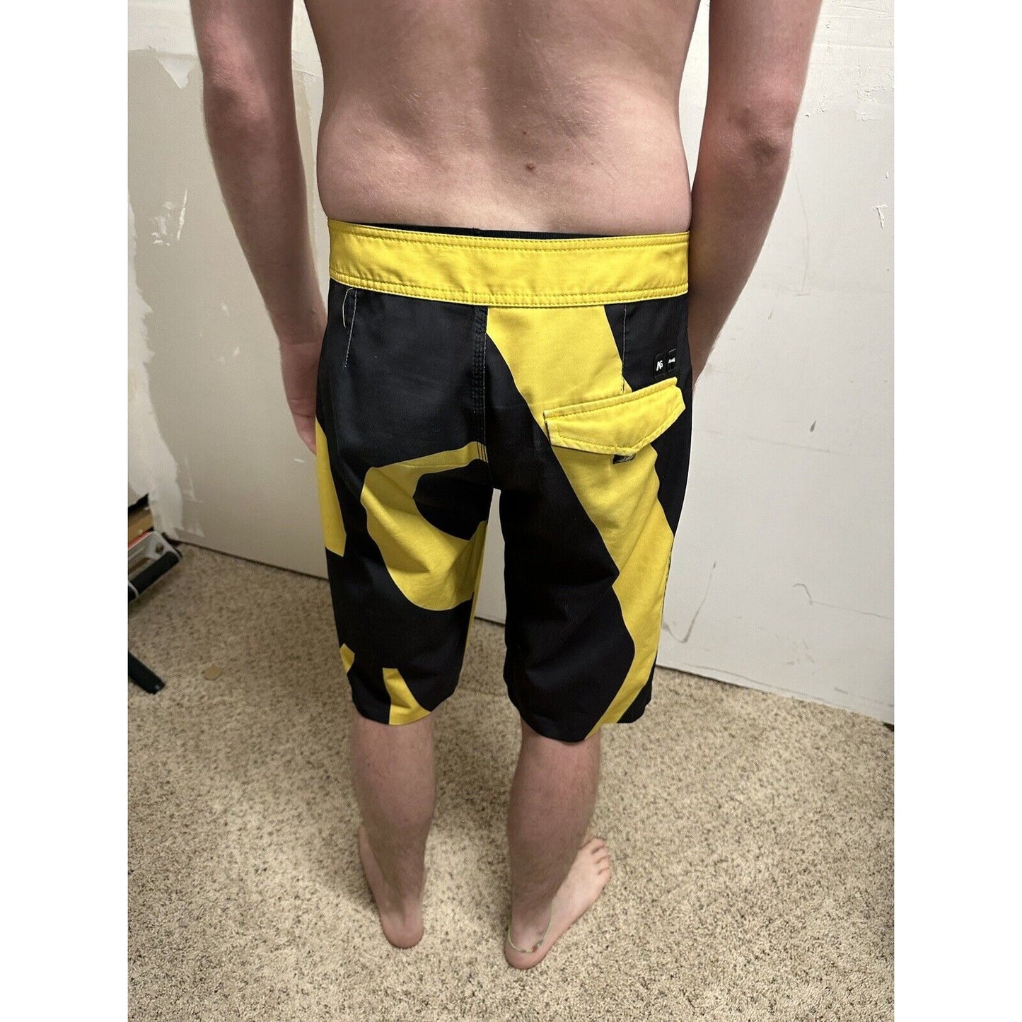 men’s analog skze 33 design unlikely futures yellow and black board shorts