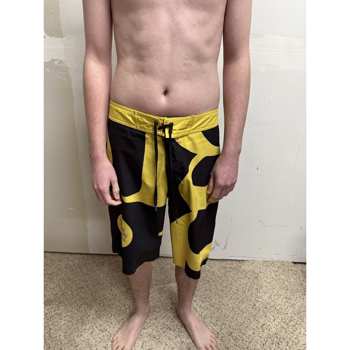 men’s analog skze 33 design unlikely futures yellow and black board shorts