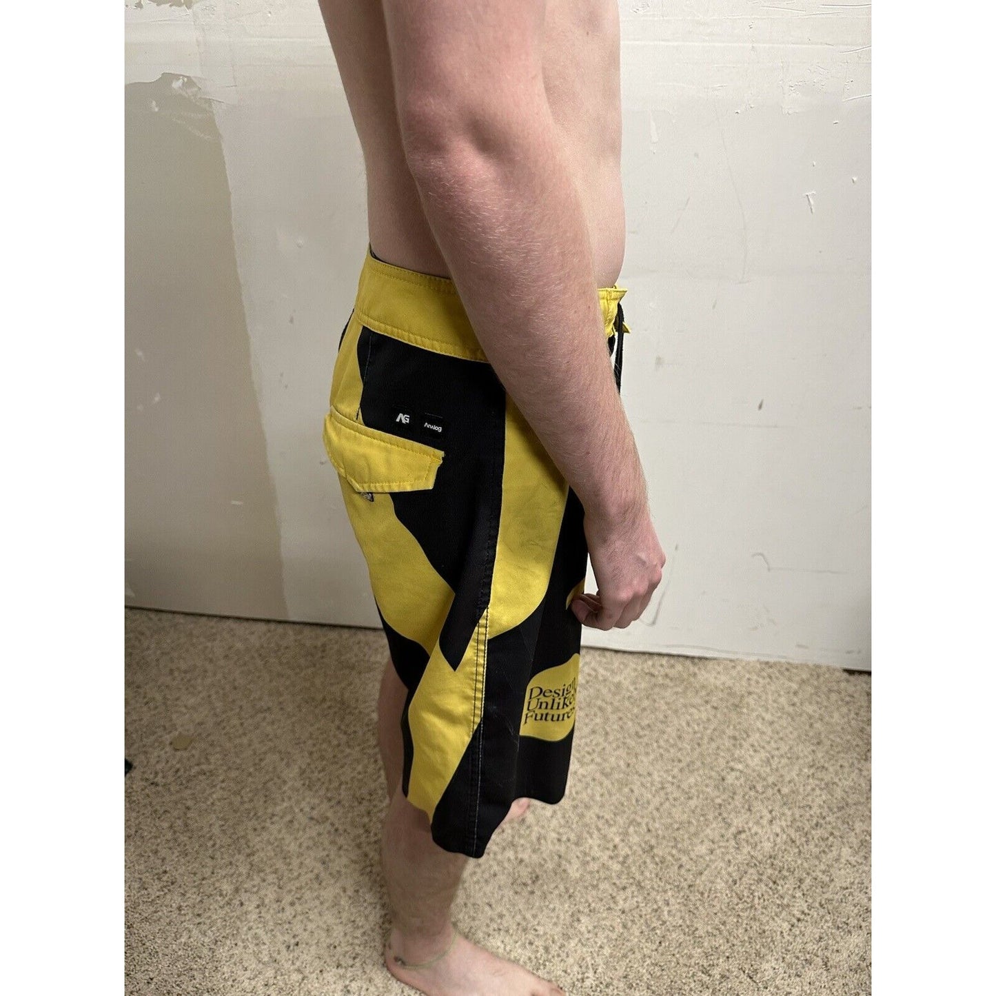 men’s analog skze 33 design unlikely futures yellow and black board shorts