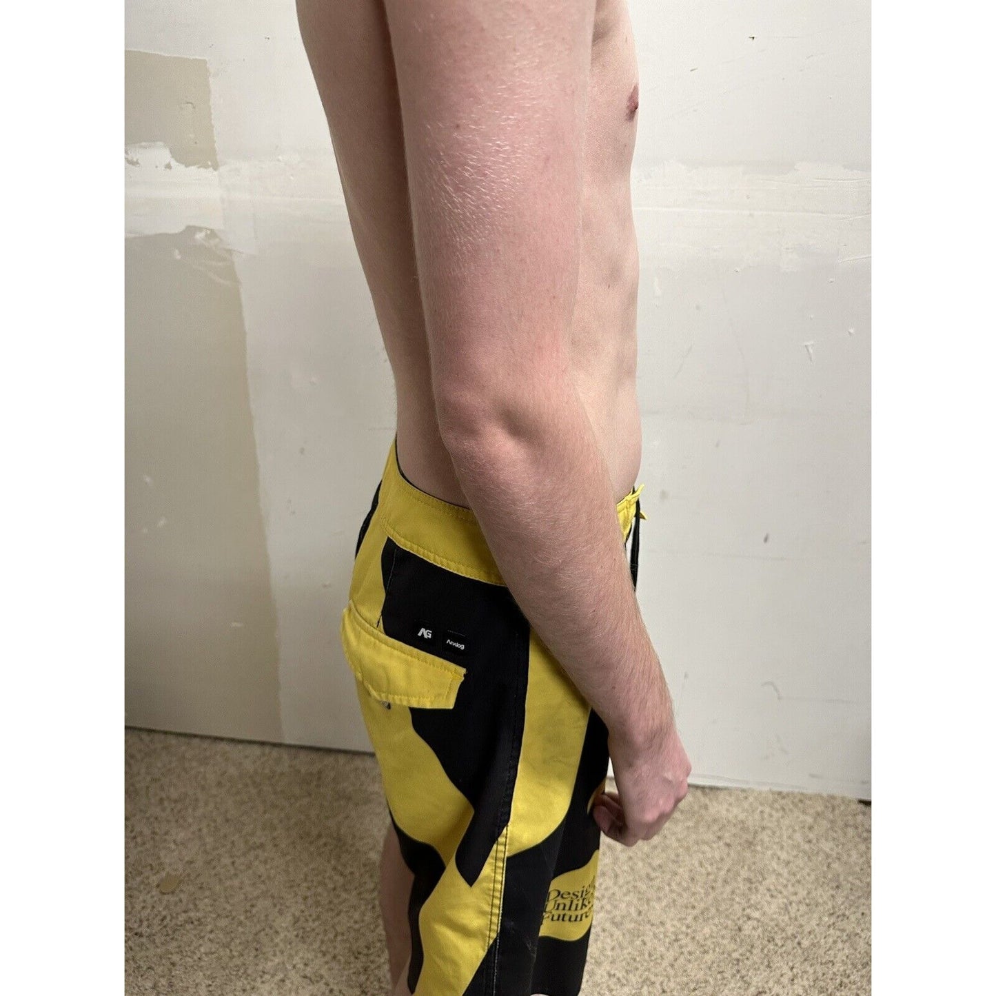 men’s analog skze 33 design unlikely futures yellow and black board shorts