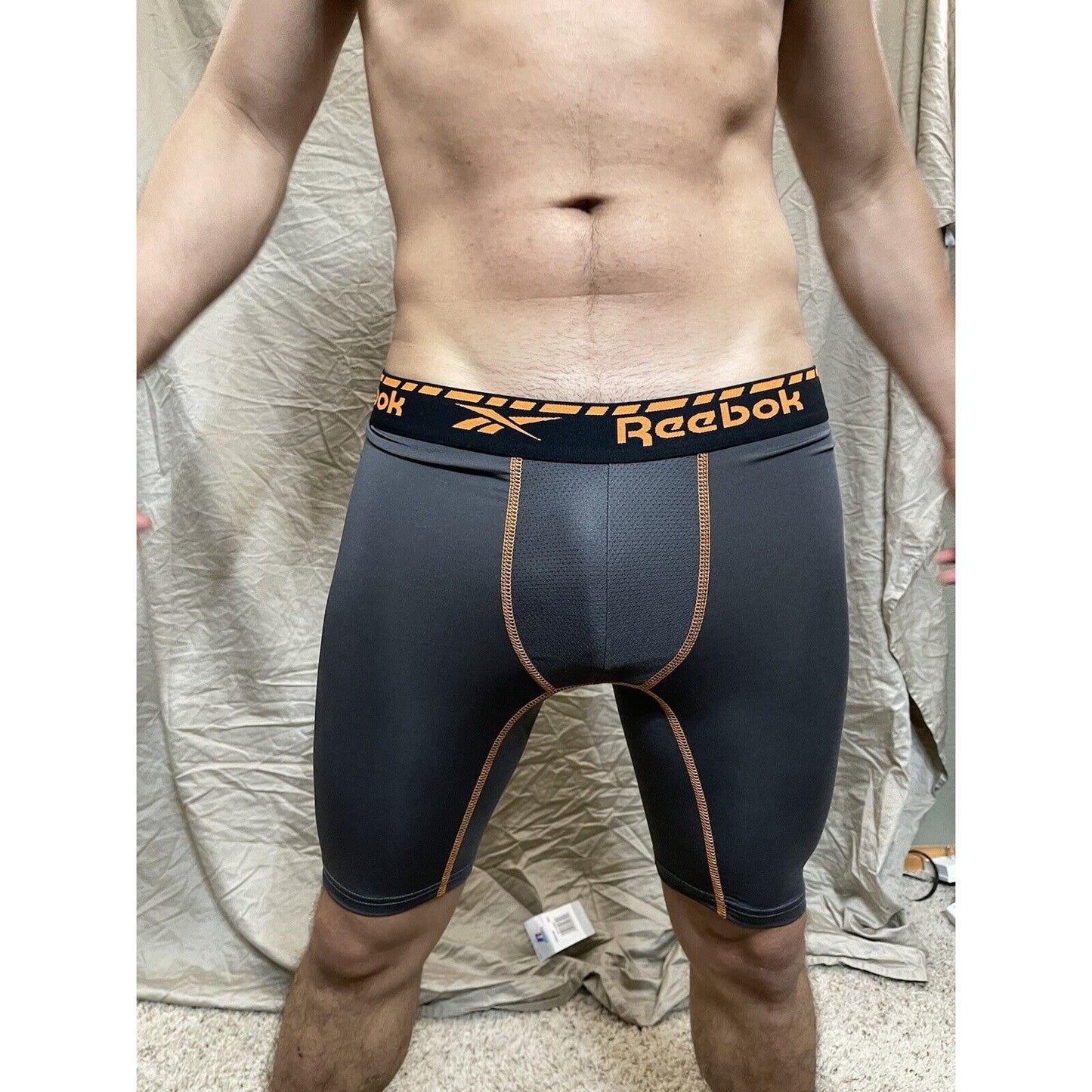 Men's gray reebok medium orange band compression shorts