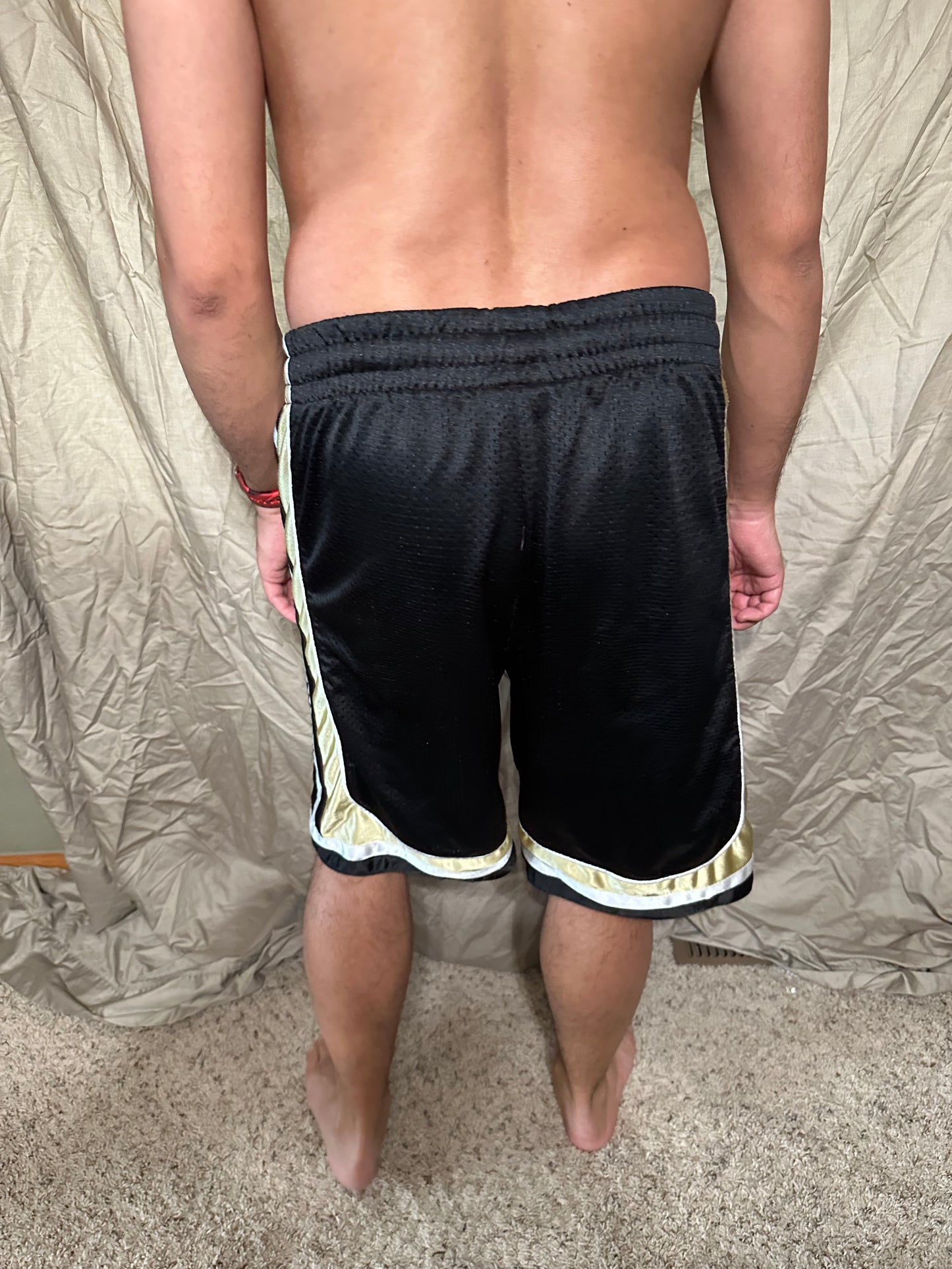 University of Colorado black and gold colosseum size small basketball shorts with pockets