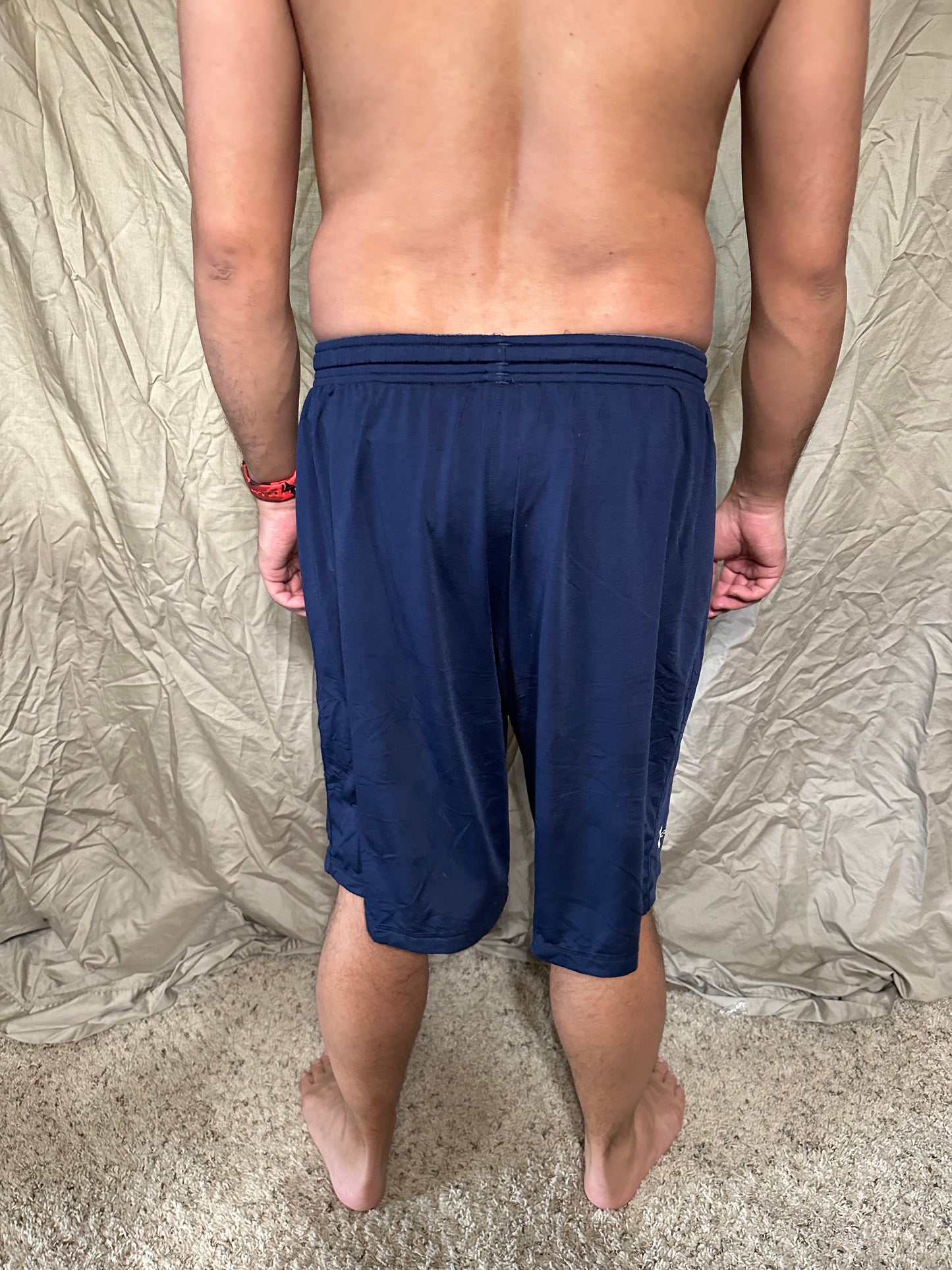 Men’s navy blue under armour heat gear loose shorts athletic no pockets rampart ridge high school track and field