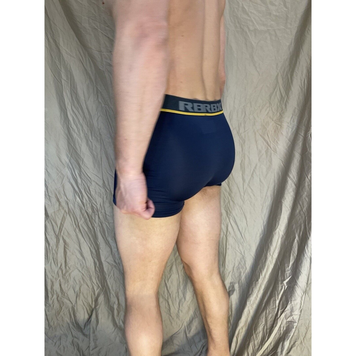 men's blue rbx compression boxer briefs yellow line on band Medium