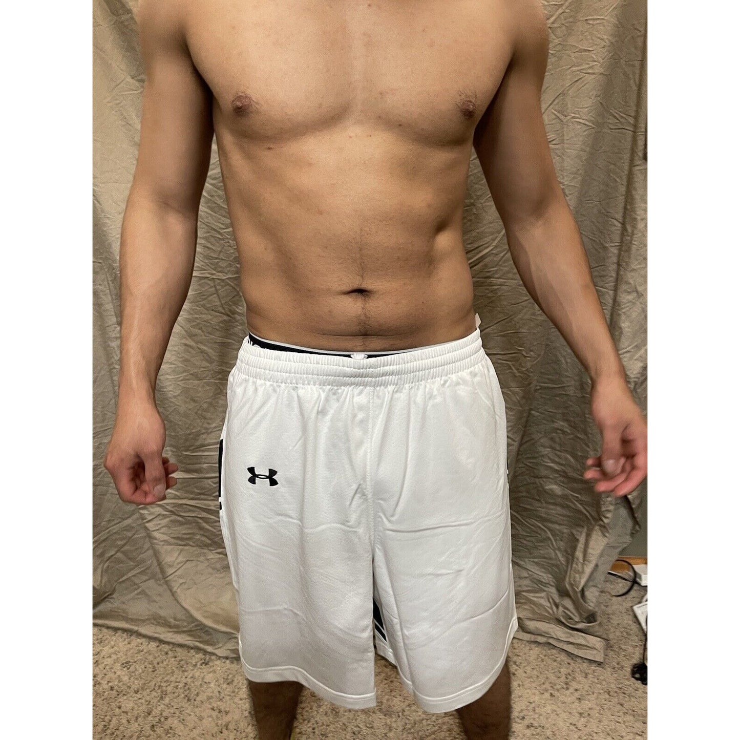 Boy's under armour Youth XL white and Black Lacrosse style shorts no pockets
