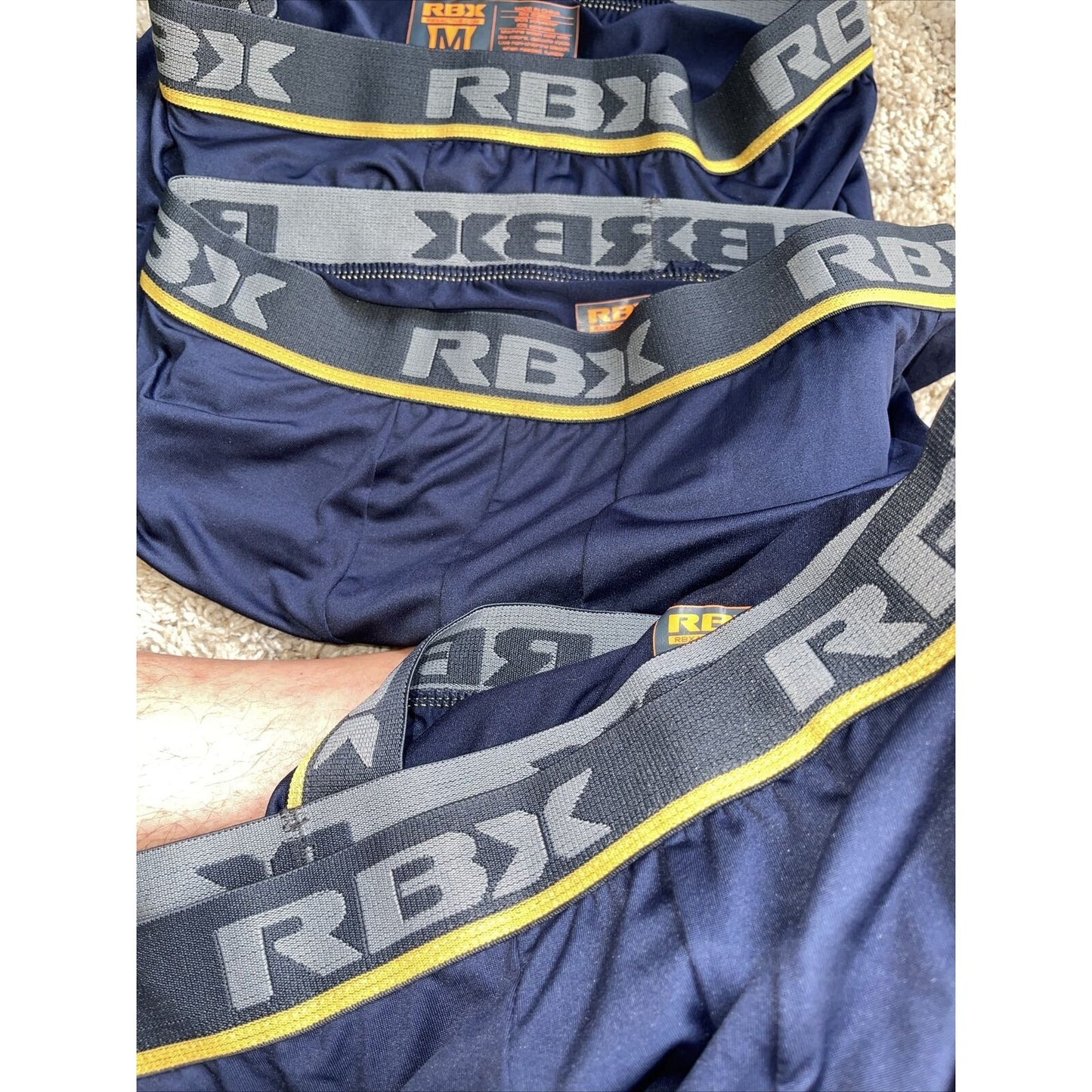 men's blue rbx compression boxer briefs yellow line on band Medium