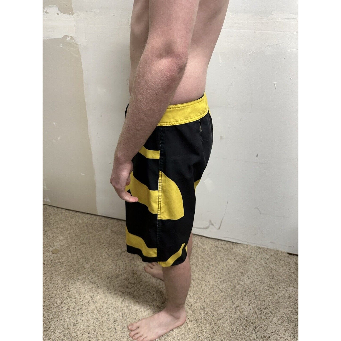 men’s analog skze 33 design unlikely futures yellow and black board shorts