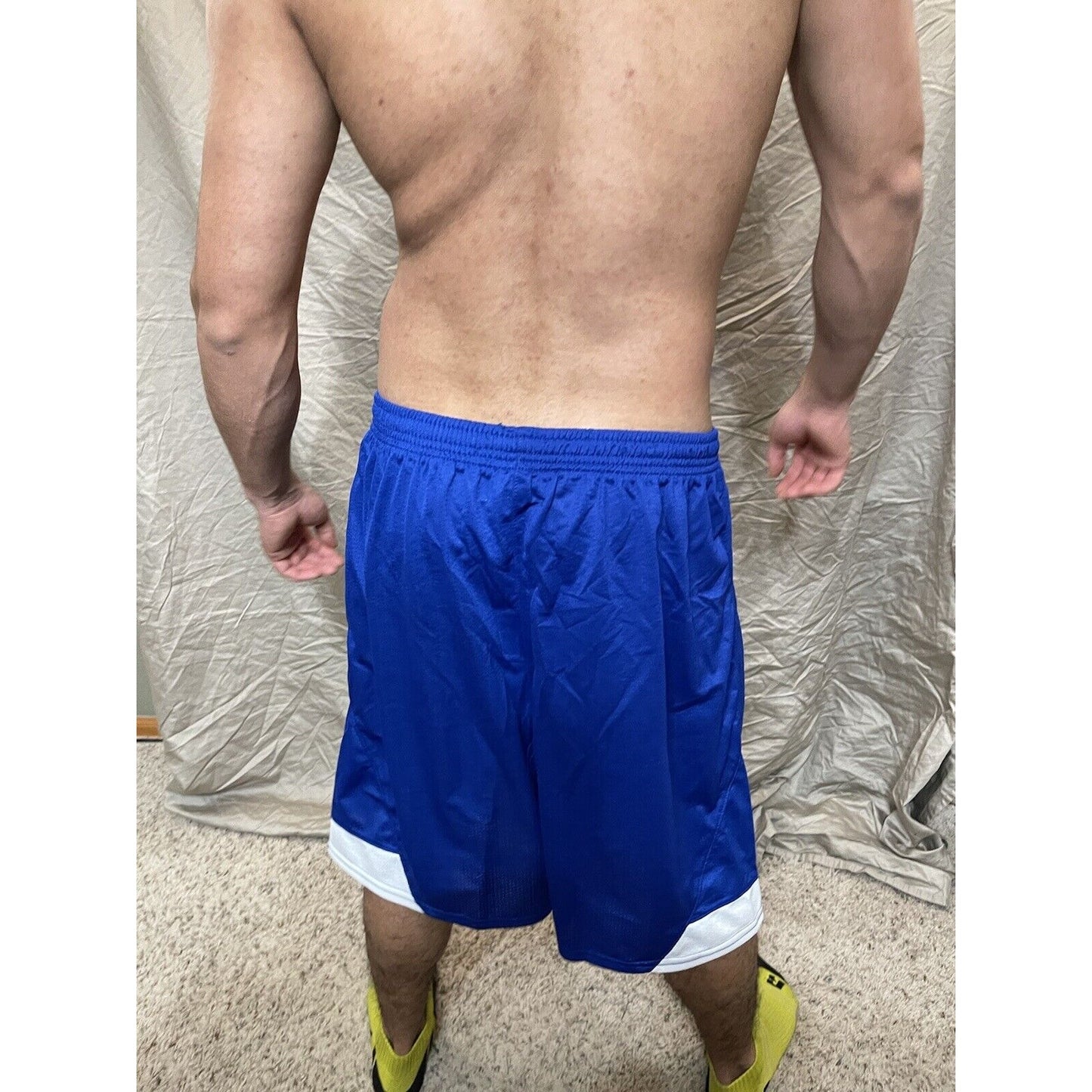 Boy's youth XL scarlet Royal Blue Under armour lacrosse style shorts