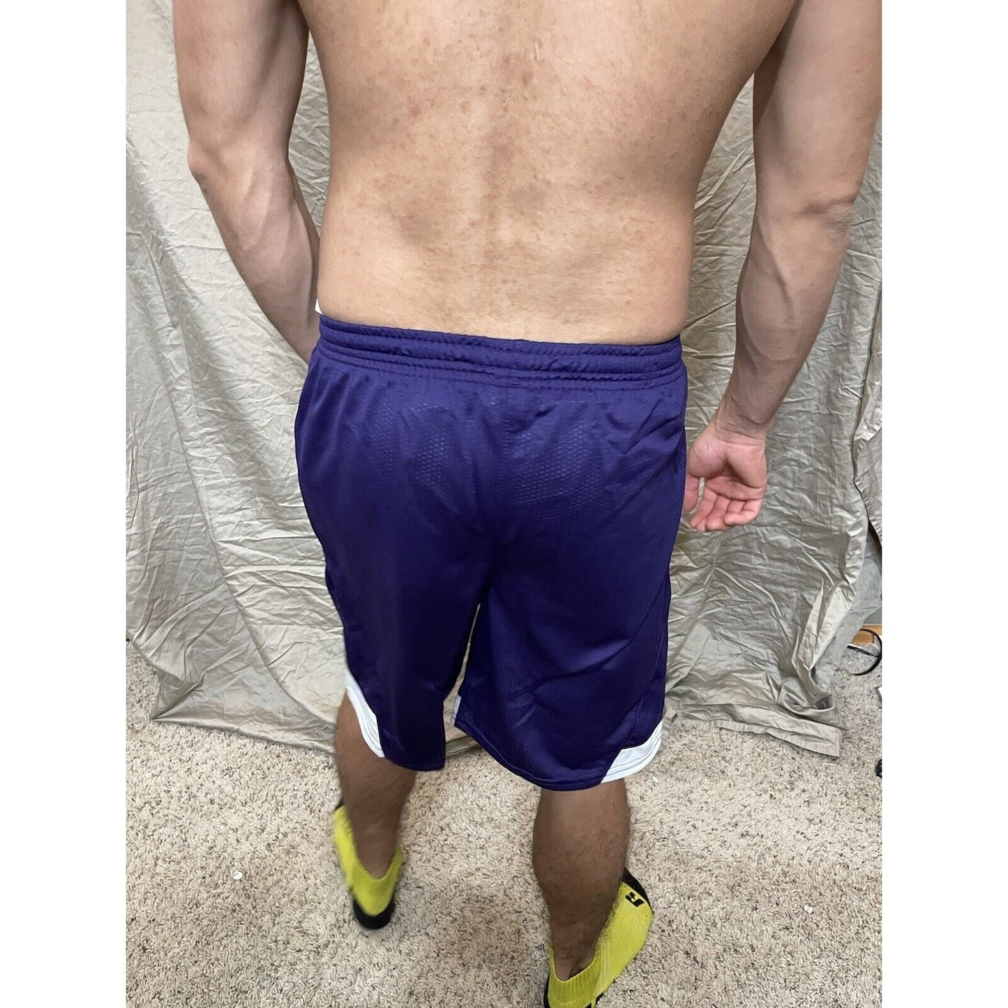 Boy's under armour Youth XL Purple And White Lacrosse style shorts no pockets