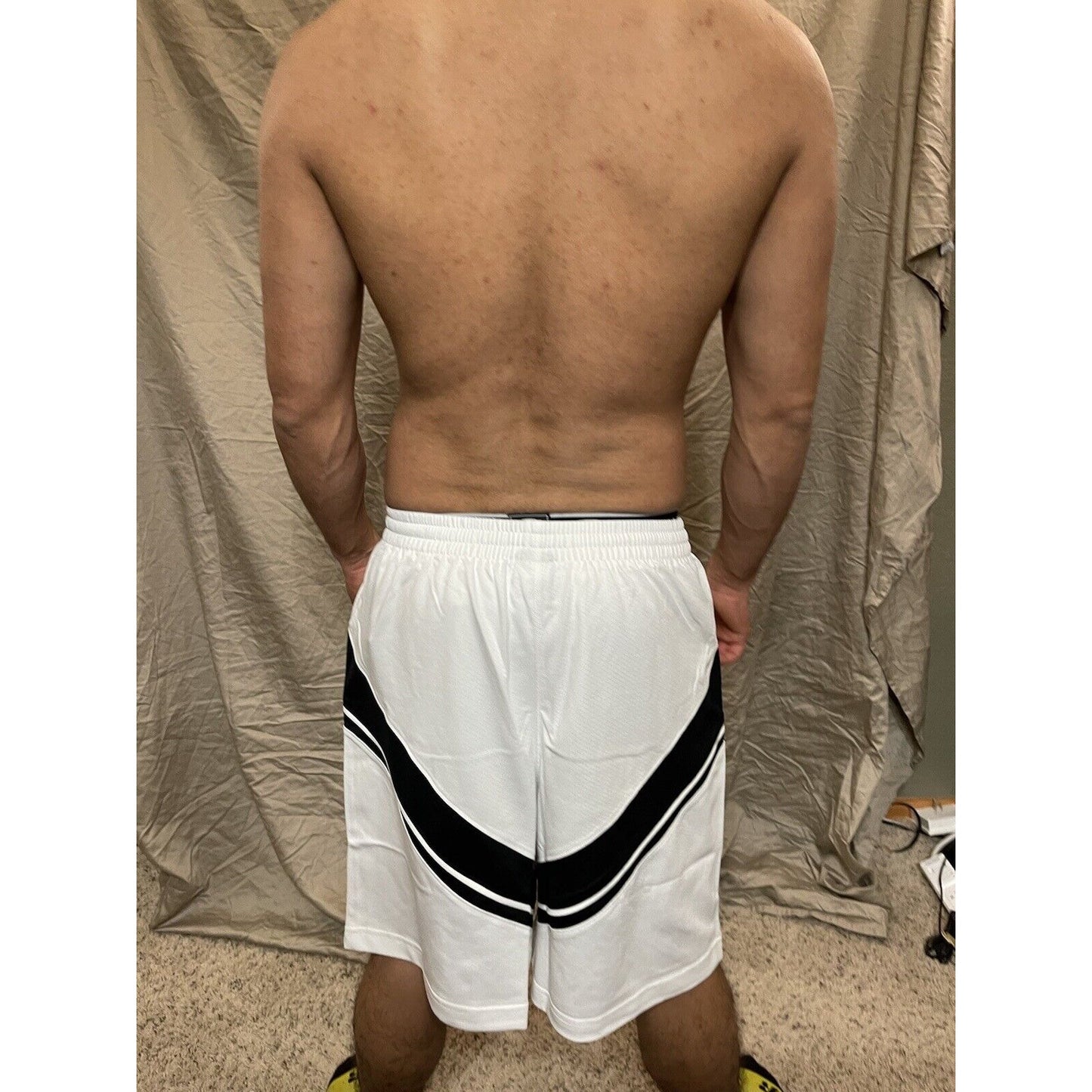 Boy's under armour Youth XL white and Black Lacrosse style shorts no pockets