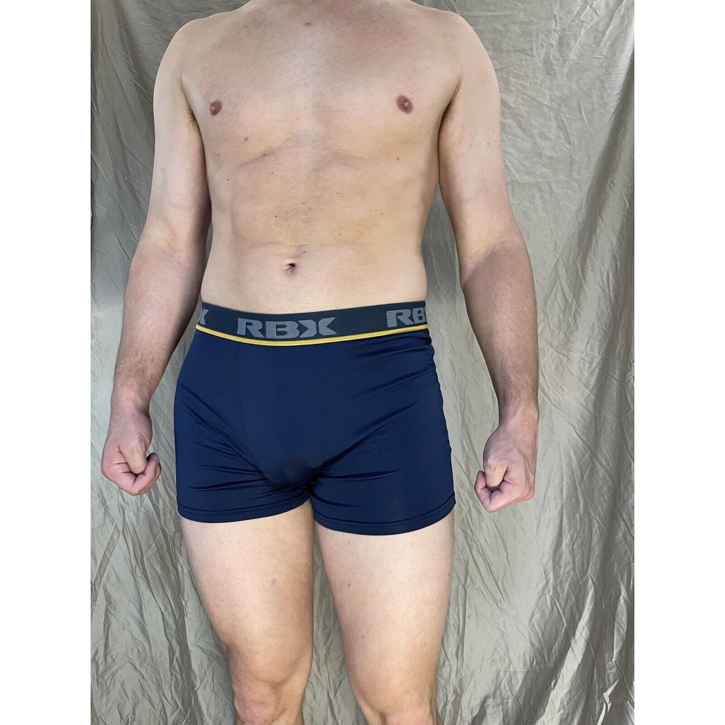 men's blue rbx compression boxer briefs yellow line on band Medium