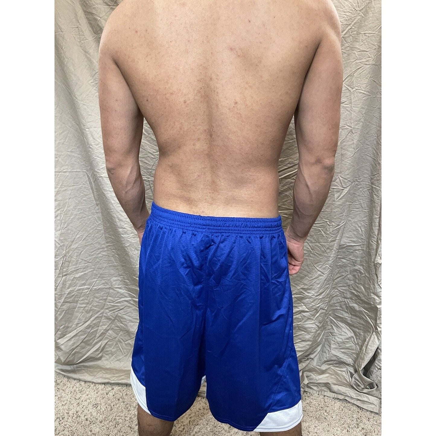 Boy's youth XL scarlet Royal Blue Under armour lacrosse style shorts