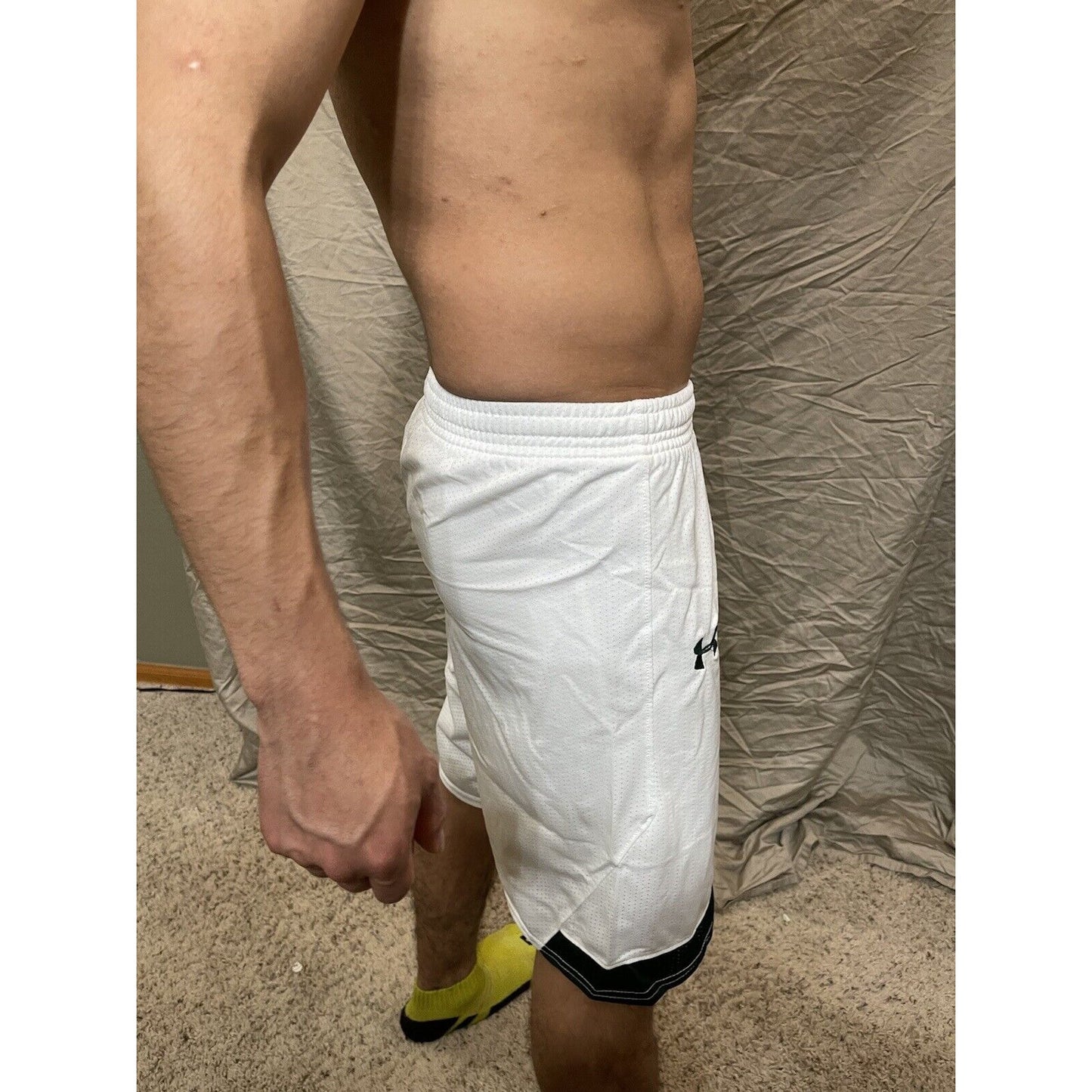 Boy's under armour Youth XL white and Green Lacrosse style shorts no pockets