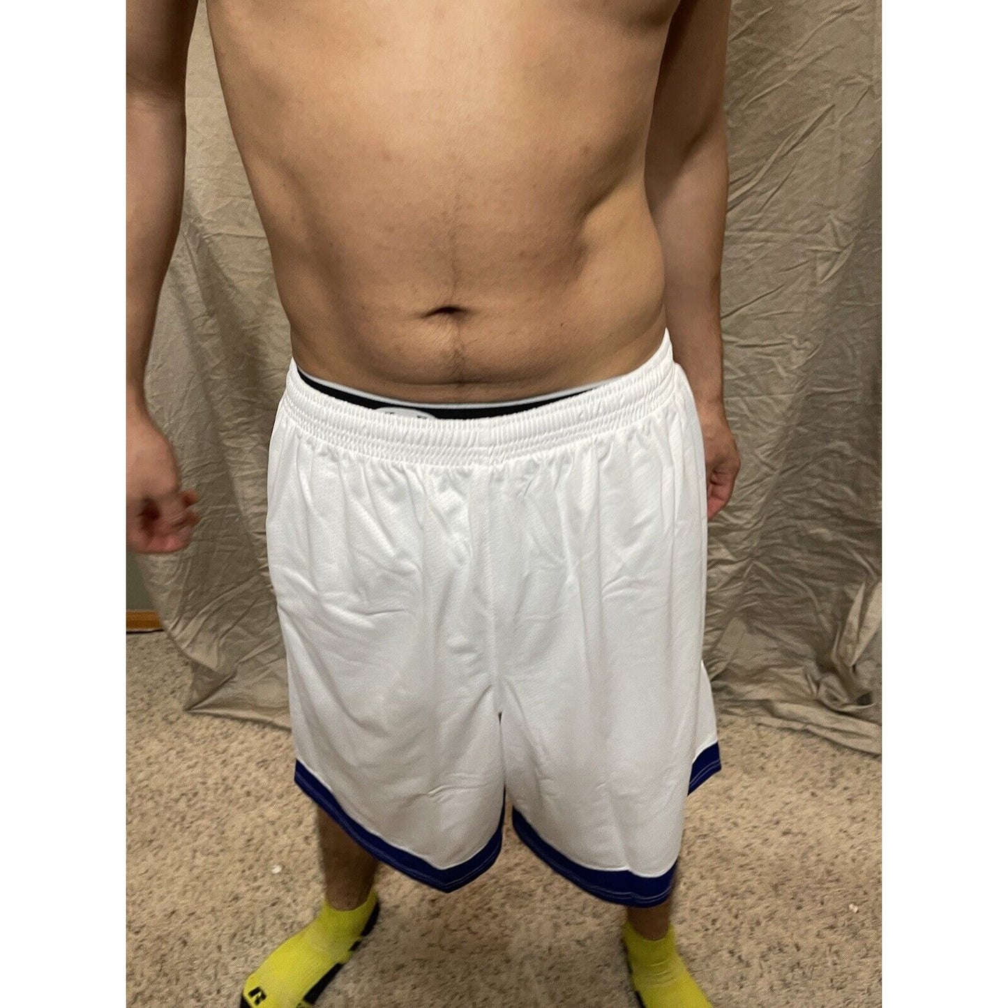 Boy's under armour Youth XL white and Blue Lacrosse style shorts no pockets
