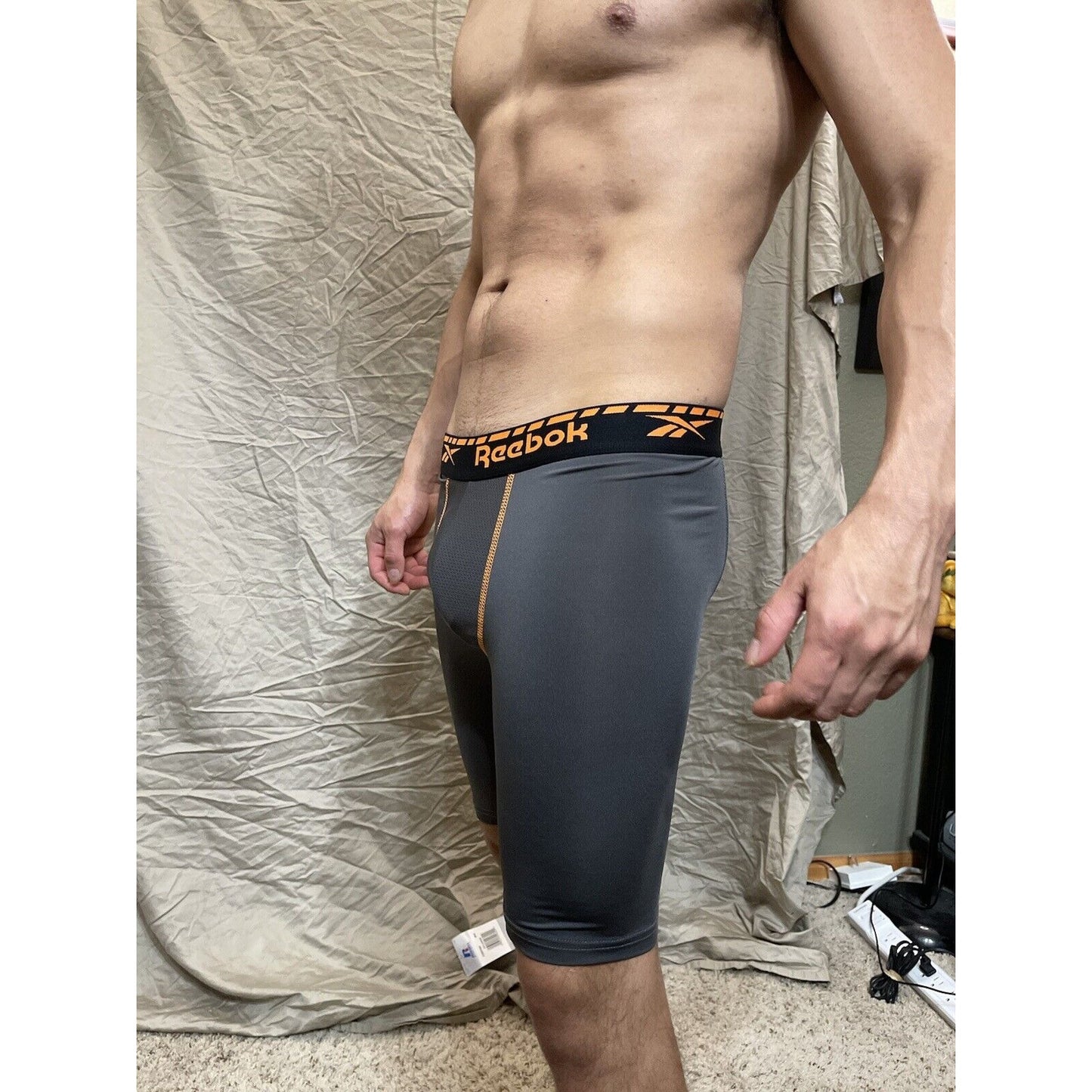 Men's gray reebok medium orange band compression shorts