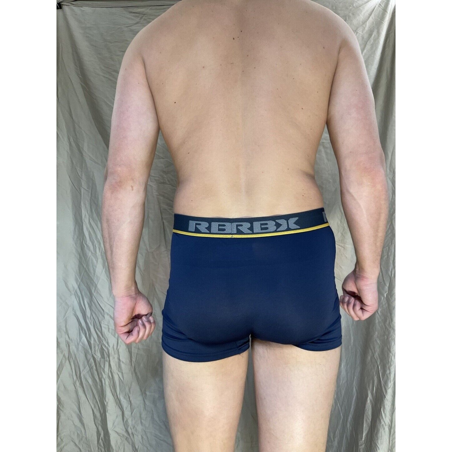 men's blue rbx compression boxer briefs yellow line on band Large