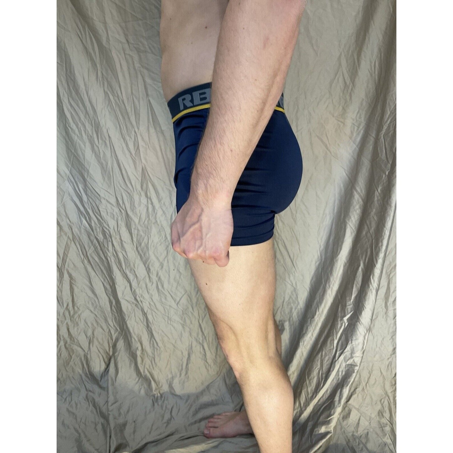 men's blue rbx compression boxer briefs yellow line on band Medium