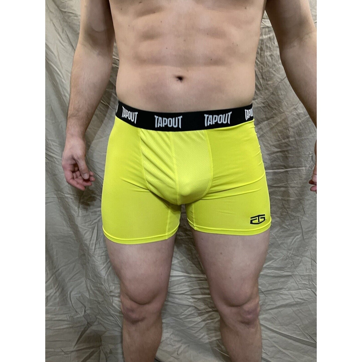 men's tapout bright yellow compression shorts Small New And Never Worn
