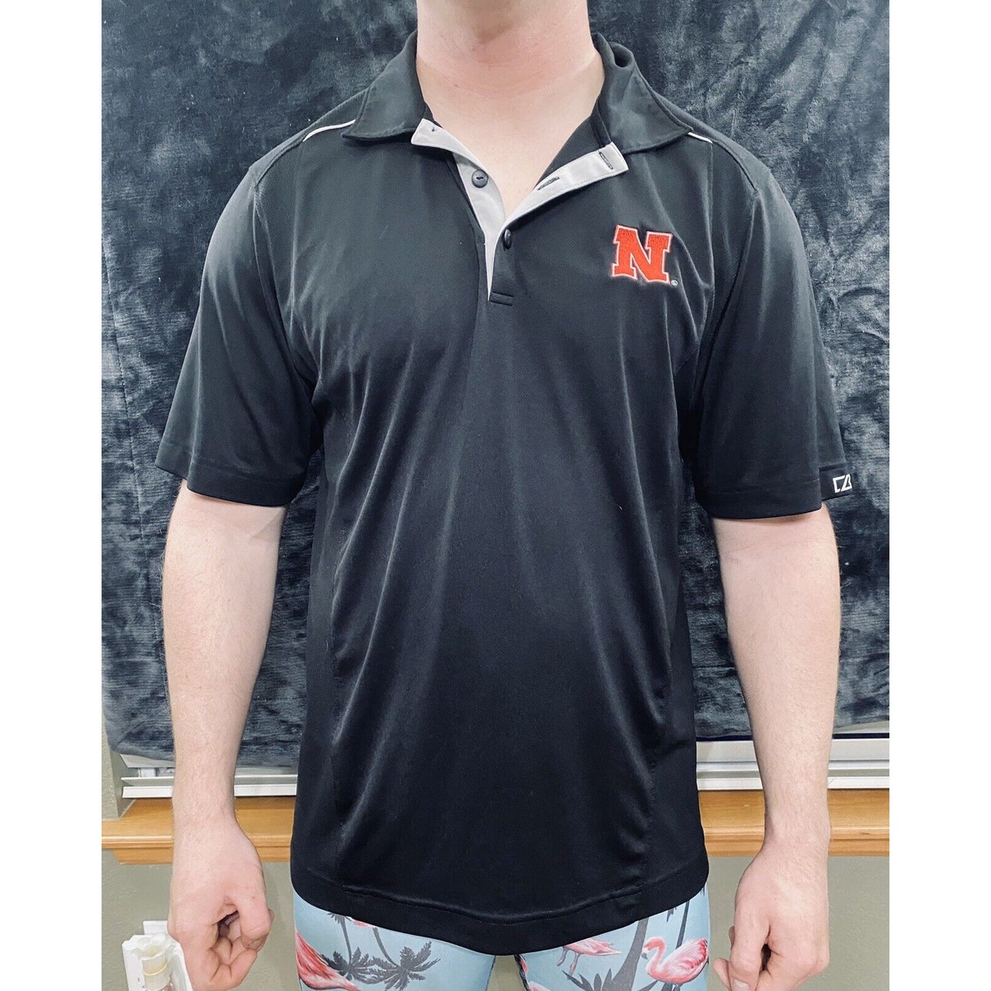 Nebraska Huskers Black Microfiber Cutter & Buck Athletic Polo Shirt