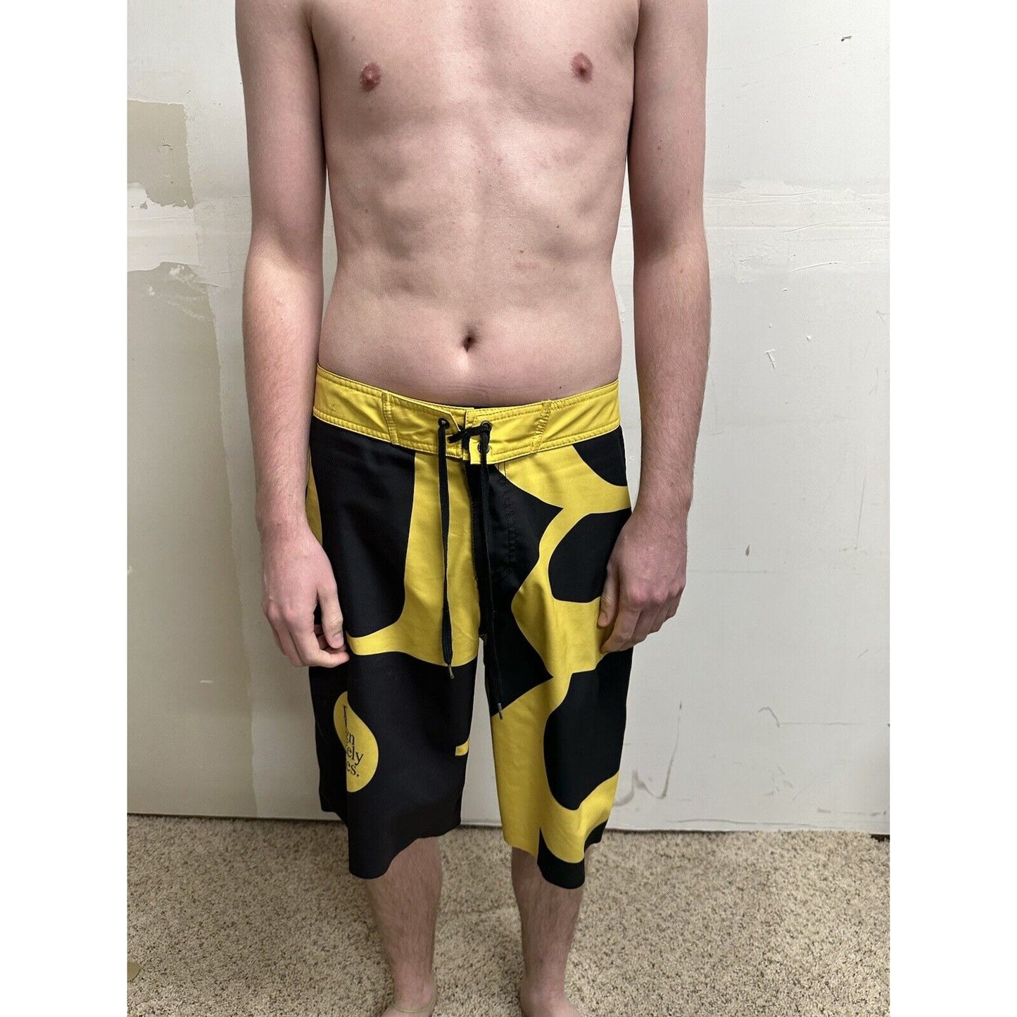 men’s analog skze 33 design unlikely futures yellow and black board shorts